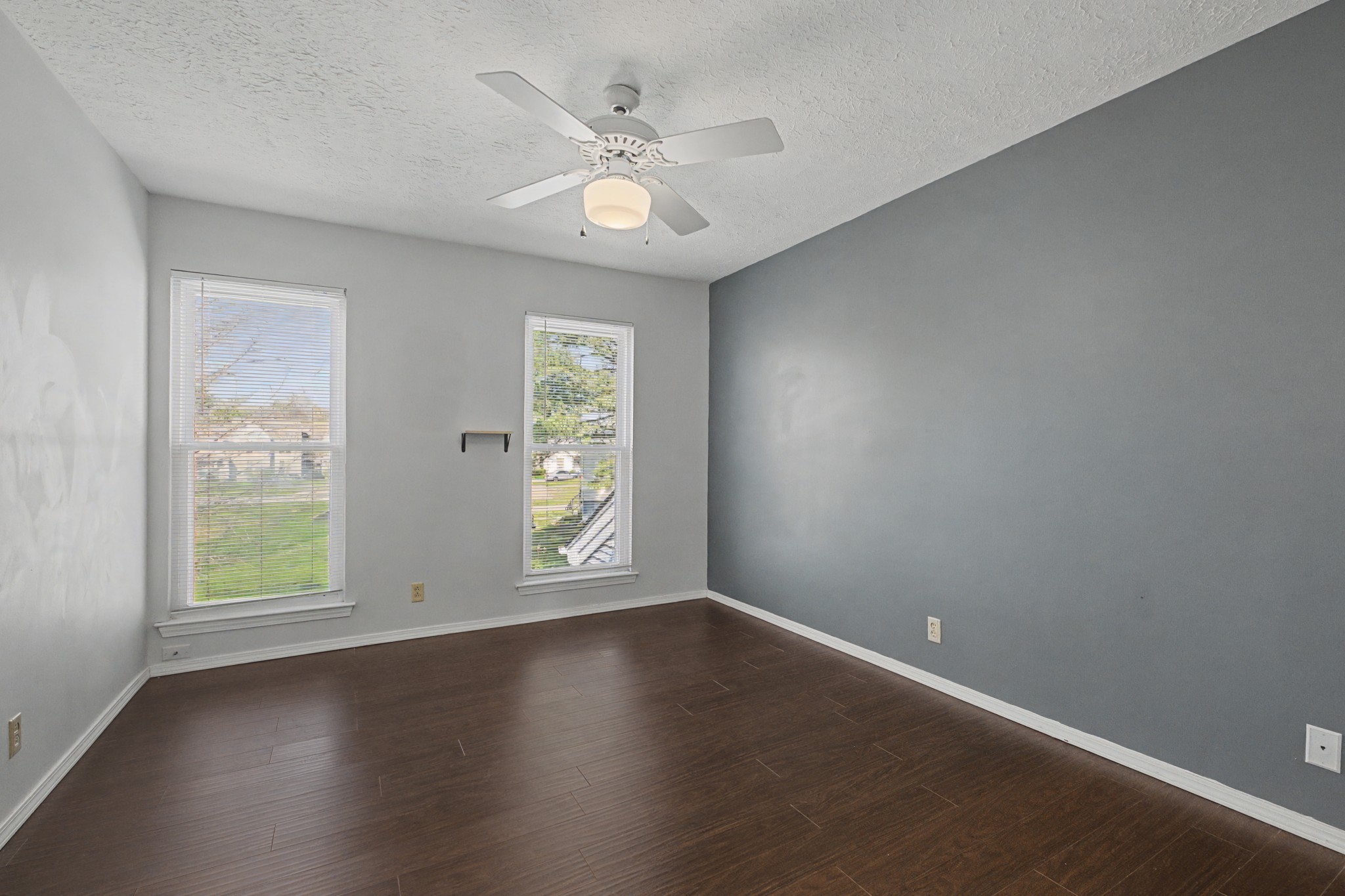 4316 Baton Rouge Drive Hermitage, TN 37076 - Photo 11 of 20 an empty room with wooden floor and windows
