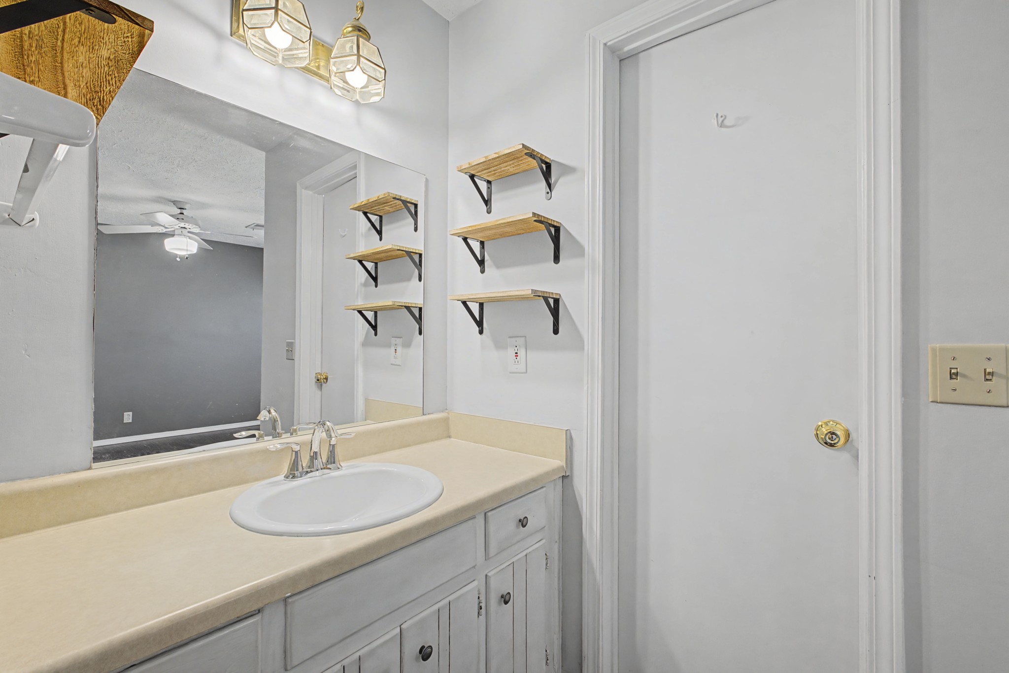 4316 Baton Rouge Drive Hermitage, TN 37076 - Photo 15 of 20 a bathroom with a sink and a mirror