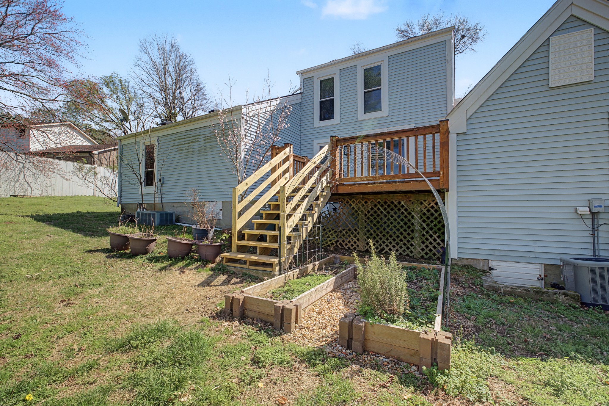 4316 Baton Rouge Drive Hermitage, TN 37076 - Photo 19 of 20 a backyard of a house with garden and outdoor seating