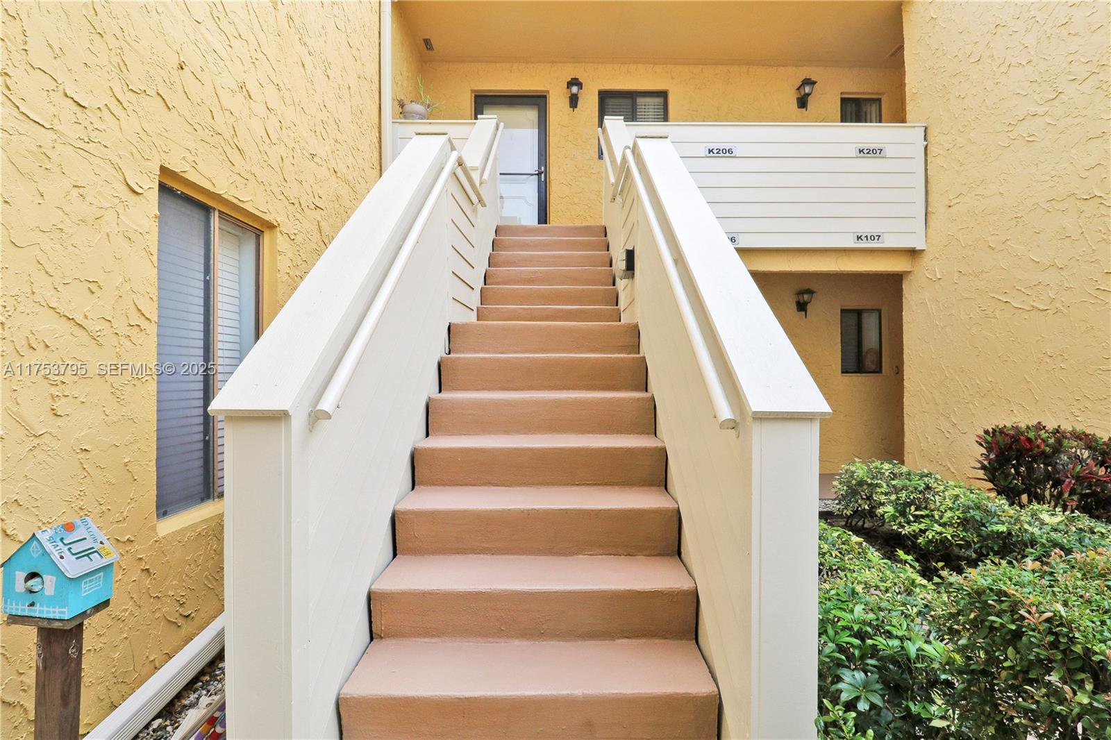 5313 Southeast Miles Grant Road, Unit 206 Stuart, FL 34997 - Photo 26 of 39 a view of entryway and hall
