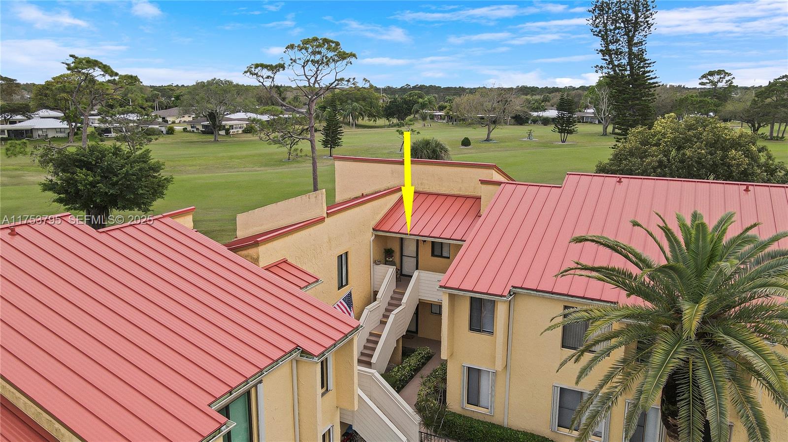 5313 Southeast Miles Grant Road, Unit 206 Stuart, FL 34997 - Photo 29 of 39 a view of a lake with a yard