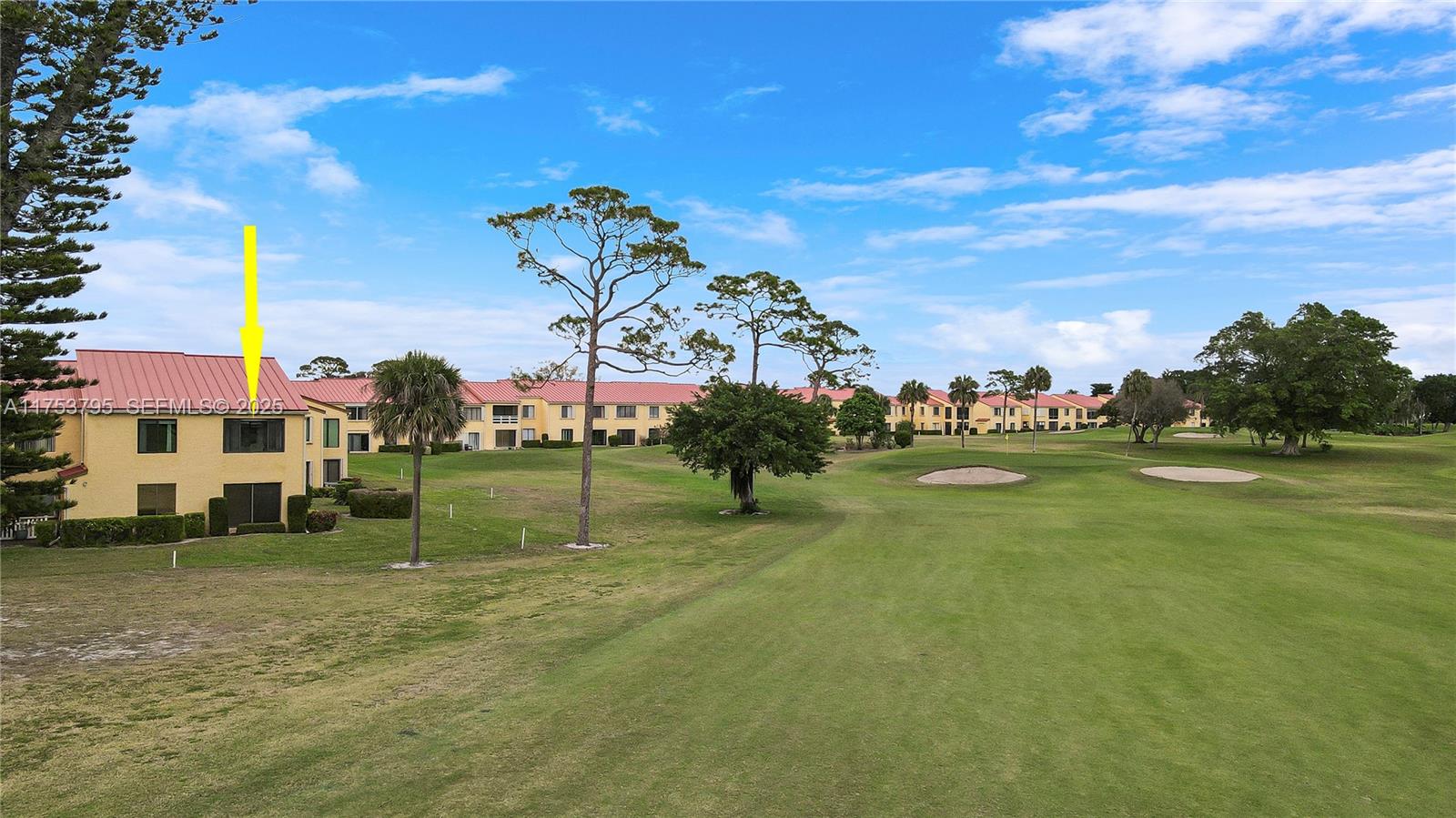 5313 Southeast Miles Grant Road, Unit 206 Stuart, FL 34997 - Photo 31 of 39 a view of a green field