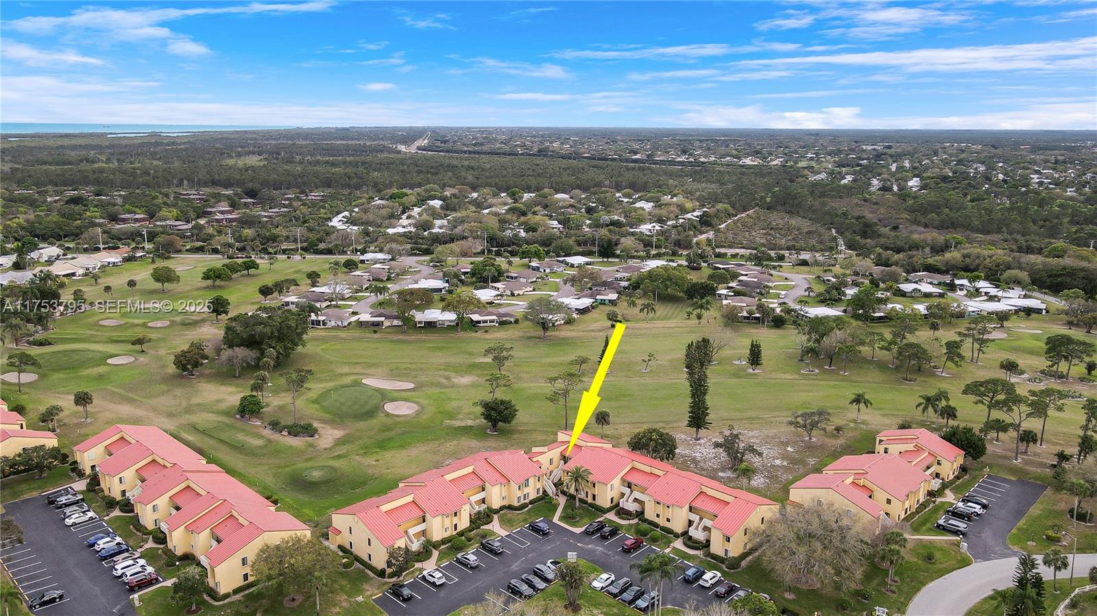 5313 Southeast Miles Grant Road, Unit 206 Stuart, FL 34997 - Photo 32 of 39 an aerial view of residential houses with outdoor space