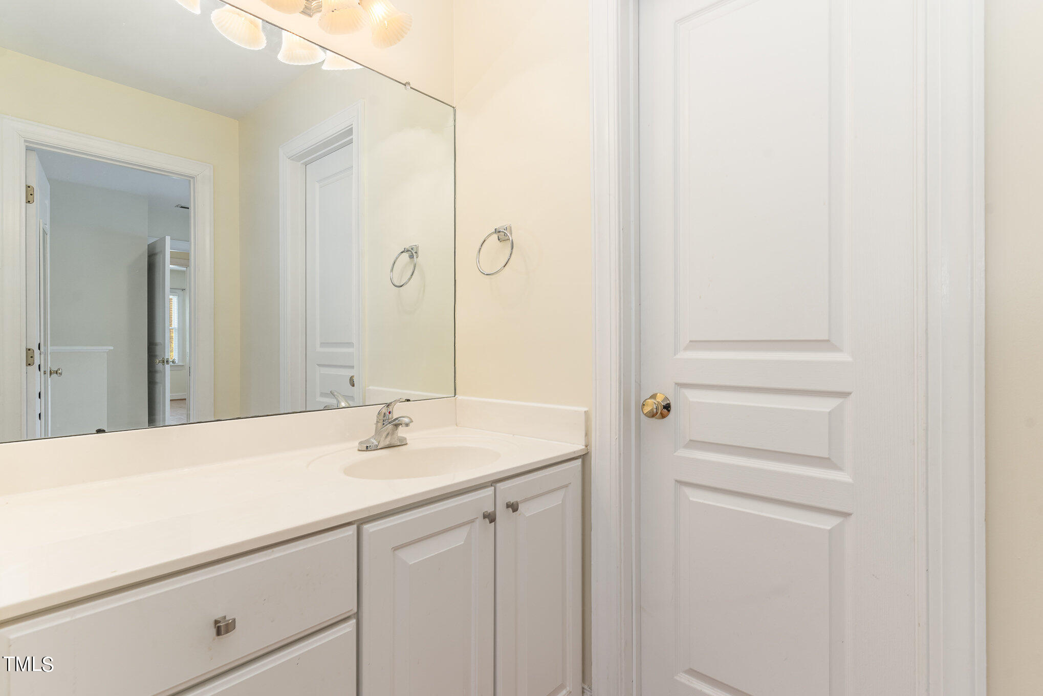 209 Stable Road Carrboro, NC 27510 - Photo 20 of 33 a bathroom with a sink and a mirror