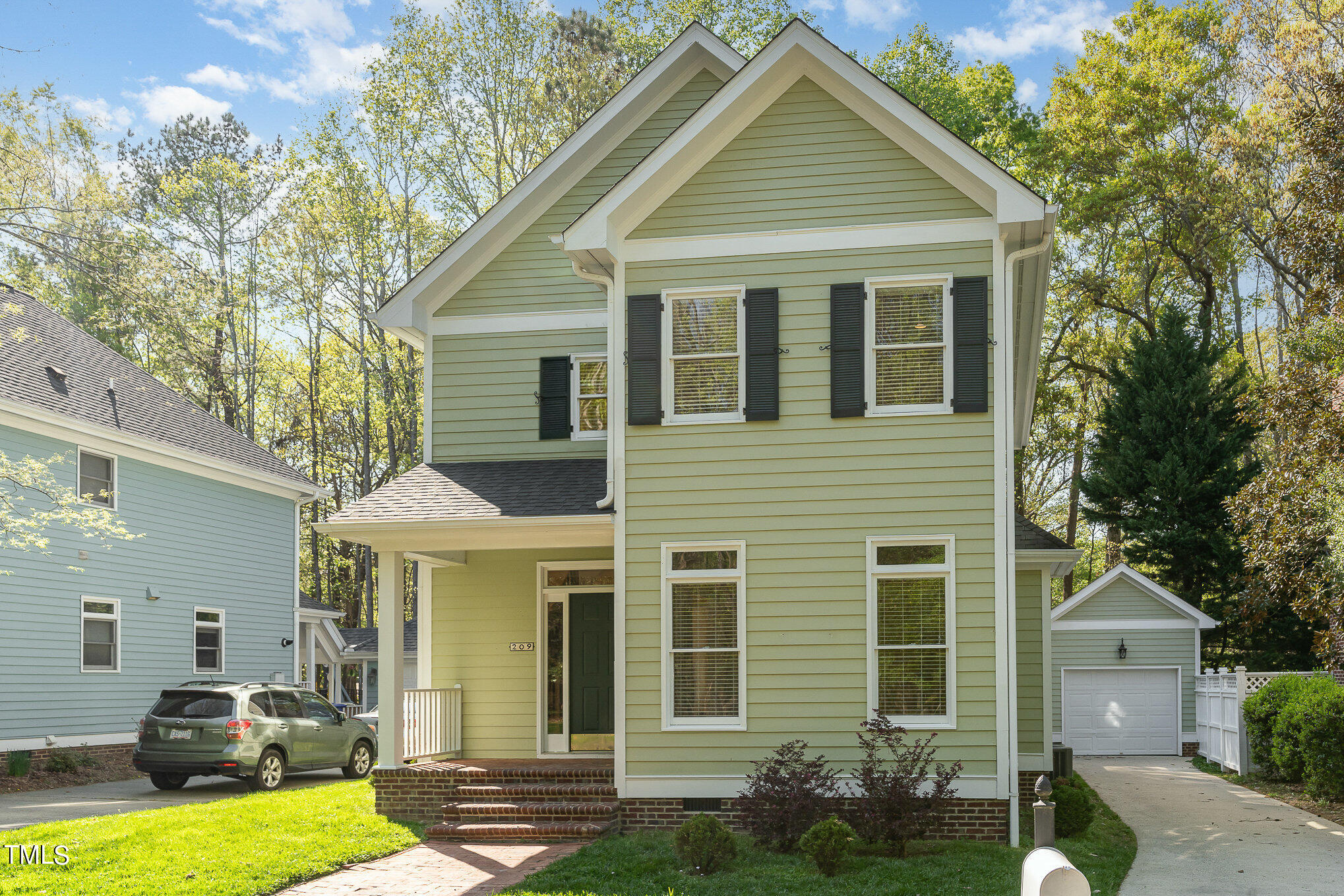 209 Stable Road Carrboro, NC 27510 - Photo 2 of 33 a view of a house with a yard