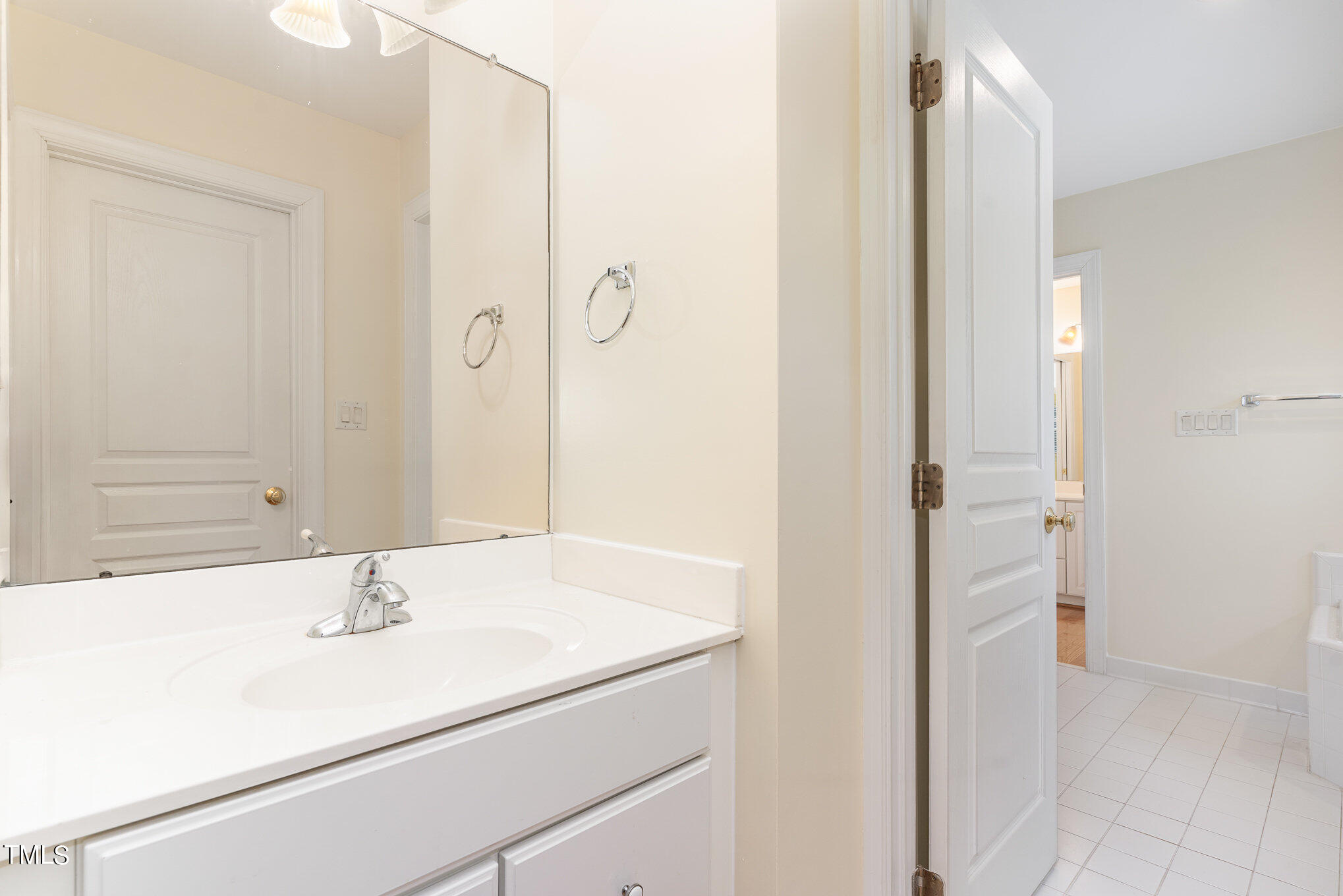 209 Stable Road Carrboro, NC 27510 - Photo 22 of 33 a bathroom with a sink and a mirror