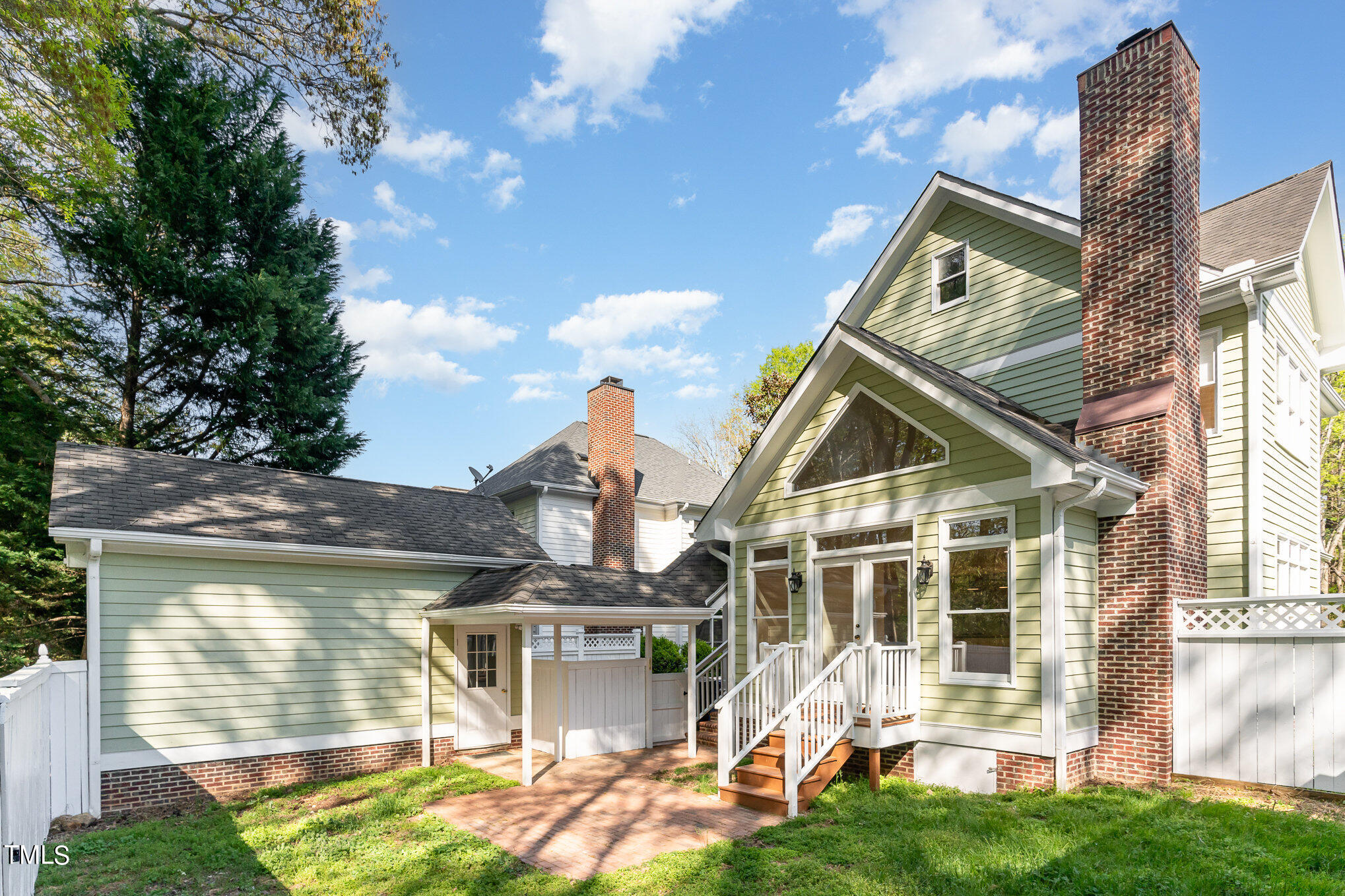 209 Stable Road Carrboro, NC 27510 - Photo 26 of 33 a front view of a house with a yard