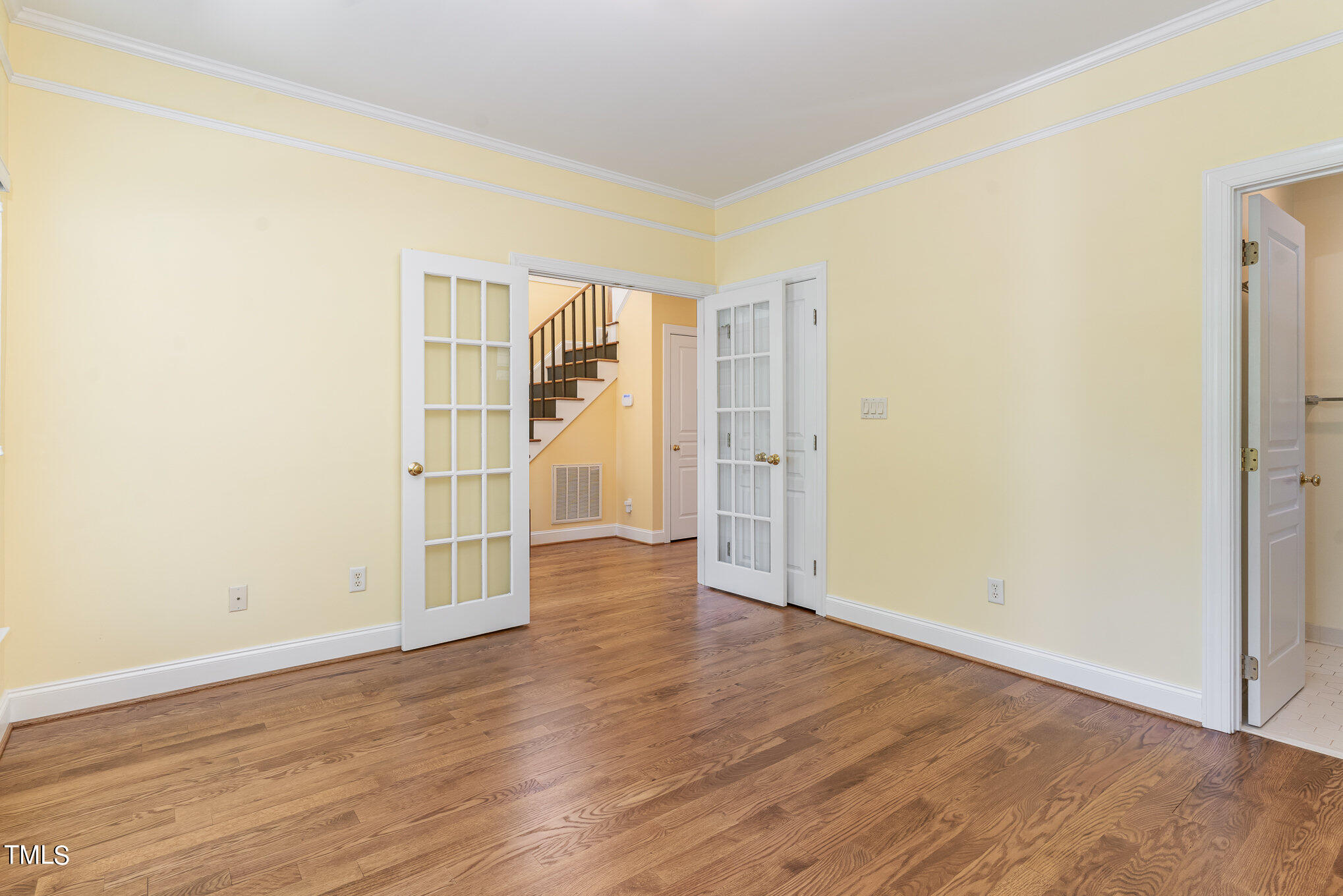 209 Stable Road Carrboro, NC 27510 - Photo 6 of 33 wooden floor in an empty room