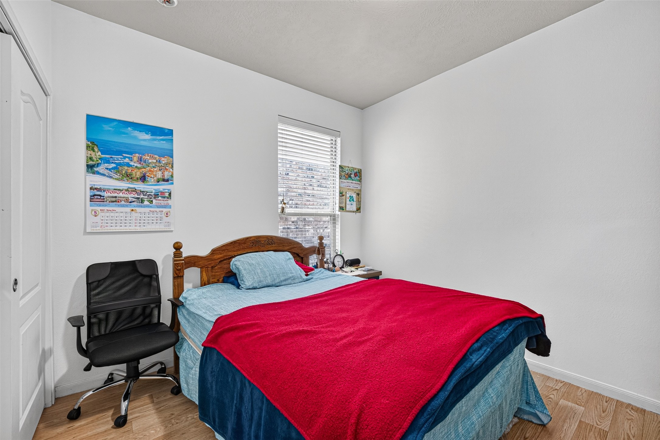 9314 Fuqua Ridge Lane Houston, TX 77075 - Photo 13 of 24 a bedroom with bed and a window