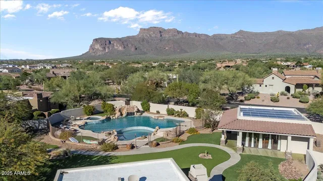 a white toilet sitting next to a shower