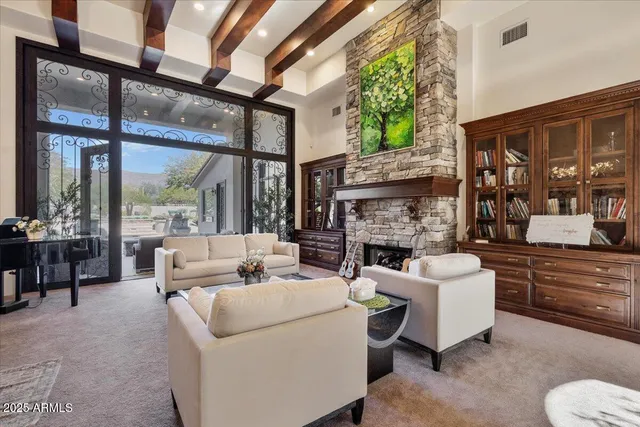 a view of bathroom with a toilet sink and mirror