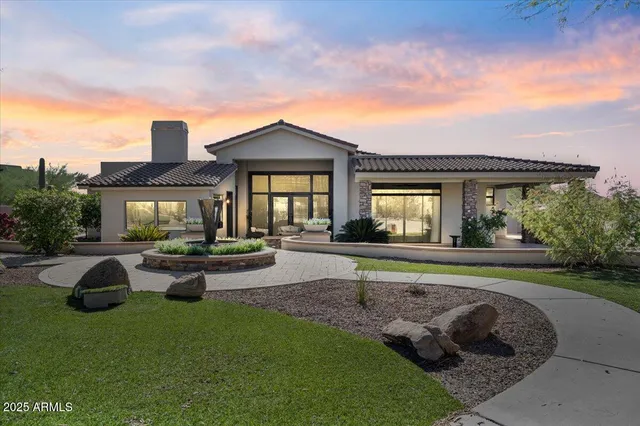 a bed room with a bed and a dresser
