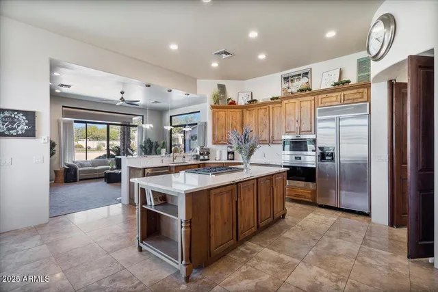 a view of a kitchen with sink washer and dryer