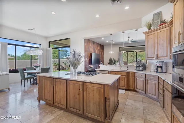 a view of a terrace with furniture and trees