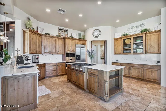a view of a backyard with sitting area