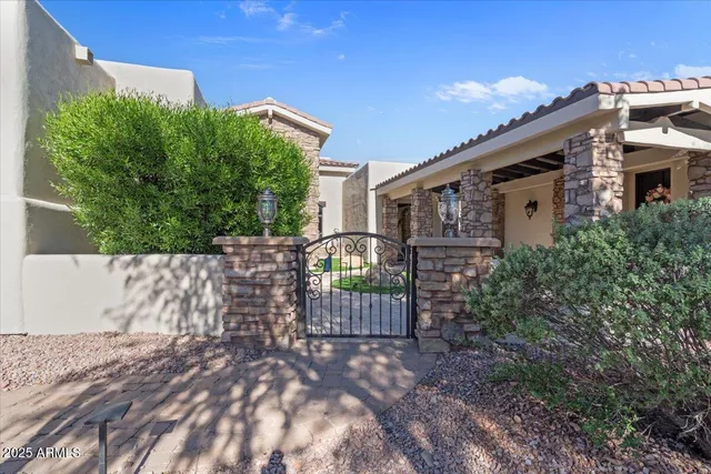 an aerial view of residential house with outdoor space and parking
