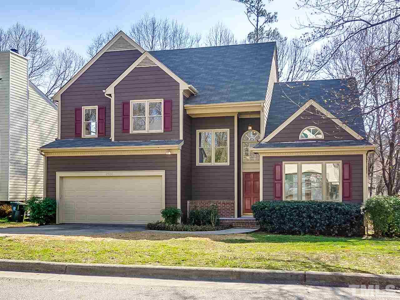 2500 Holbrook Court Raleigh, NC 27604 - Photo 1 of 26 a front view of a house with yard and green space