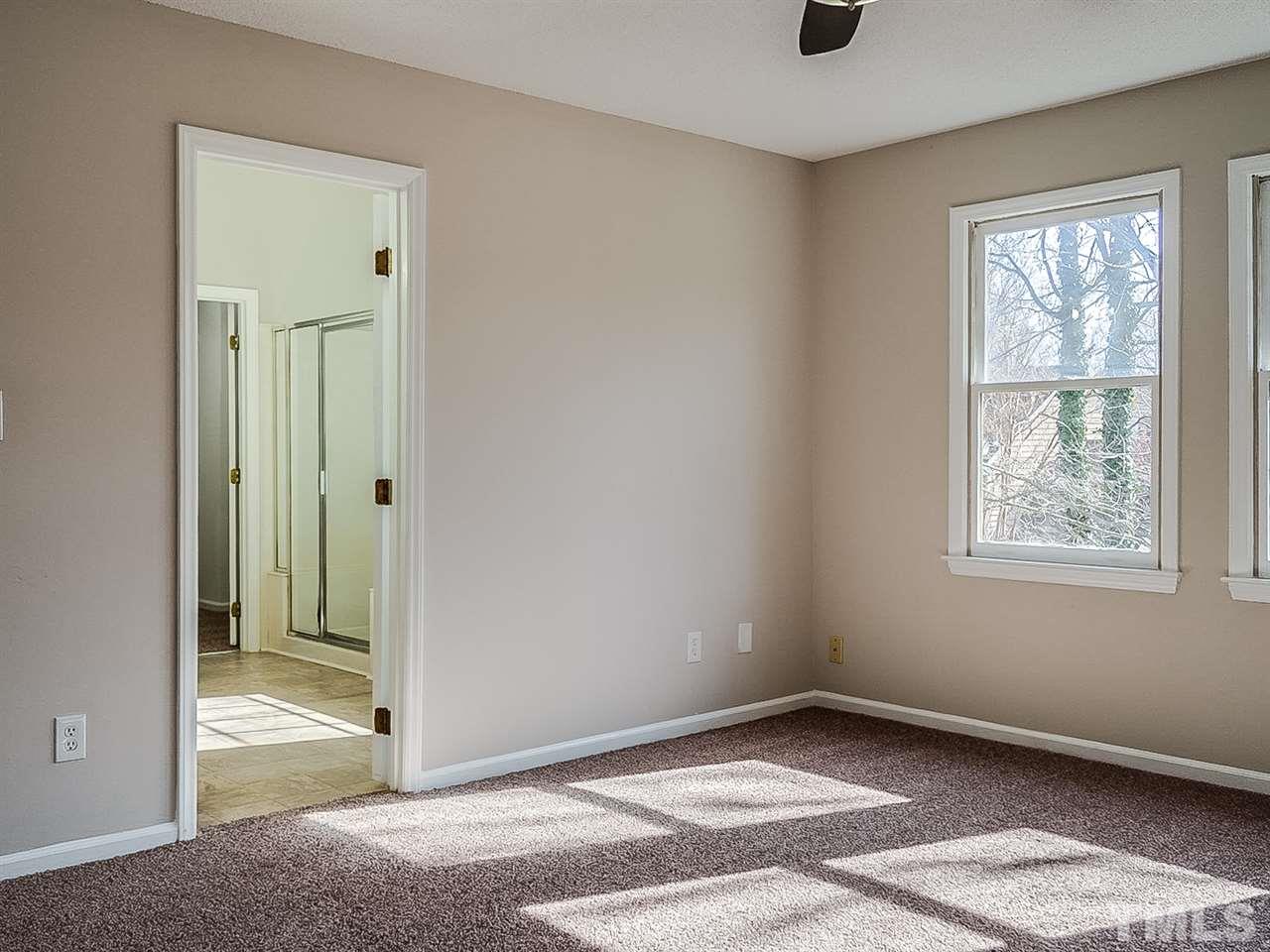 2500 Holbrook Court Raleigh, NC 27604 - Photo 13 of 26 an empty room with windows and closet