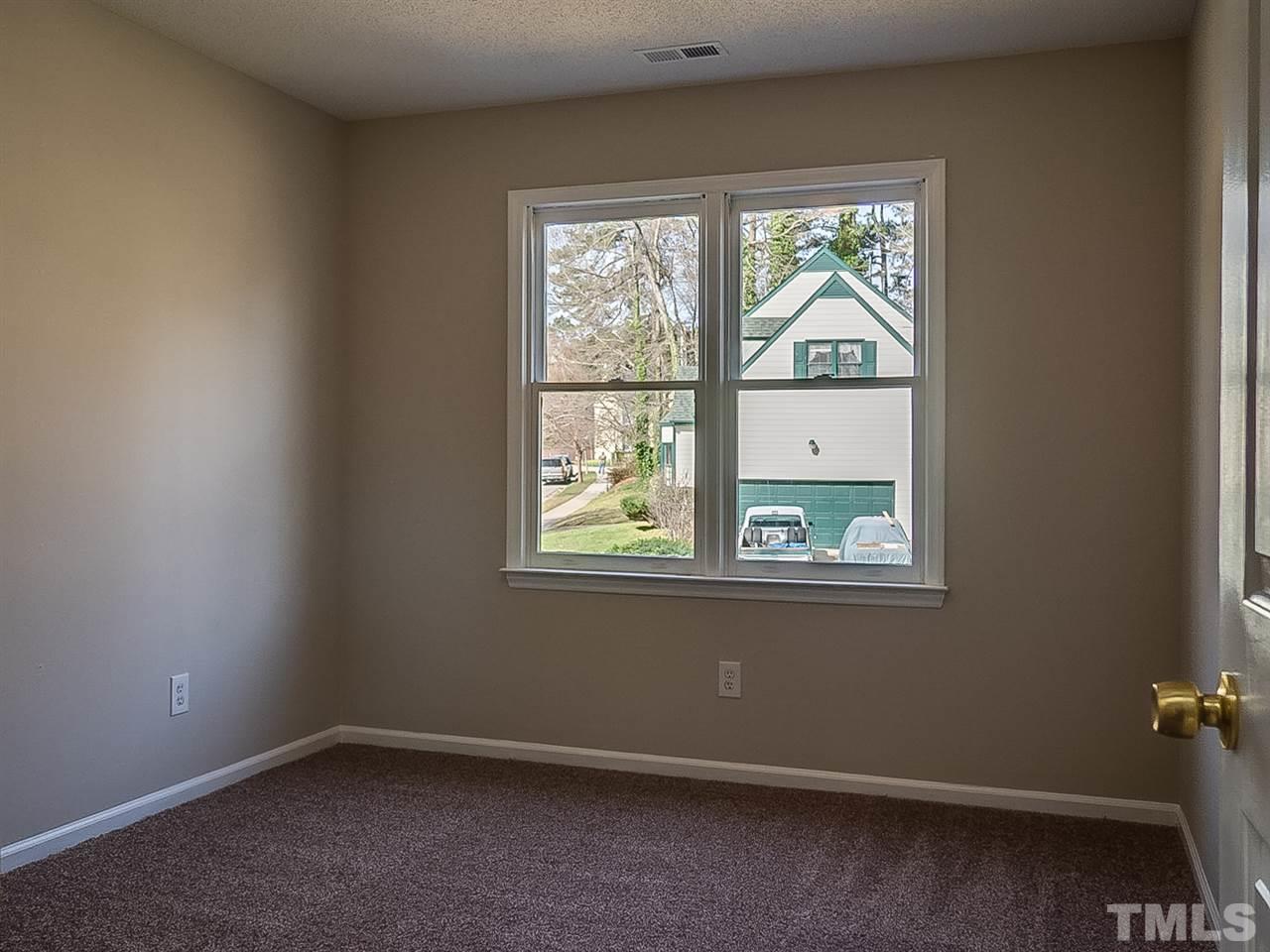2500 Holbrook Court Raleigh, NC 27604 - Photo 17 of 26 an empty room with a window