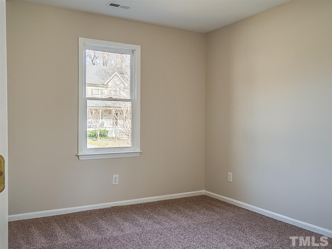 2500 Holbrook Court Raleigh, NC 27604 - Photo 19 of 26 an empty room with windows