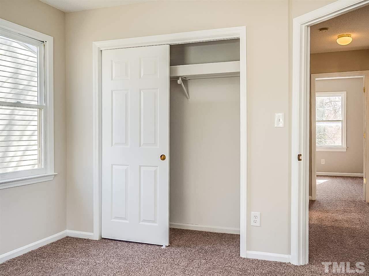 2500 Holbrook Court Raleigh, NC 27604 - Photo 20 of 26 a view of an empty room with windows and bathroom