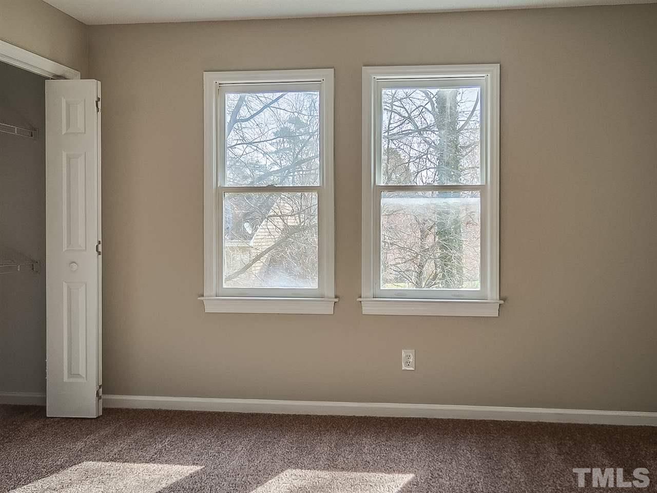 2500 Holbrook Court Raleigh, NC 27604 - Photo 21 of 26 an empty room with a window