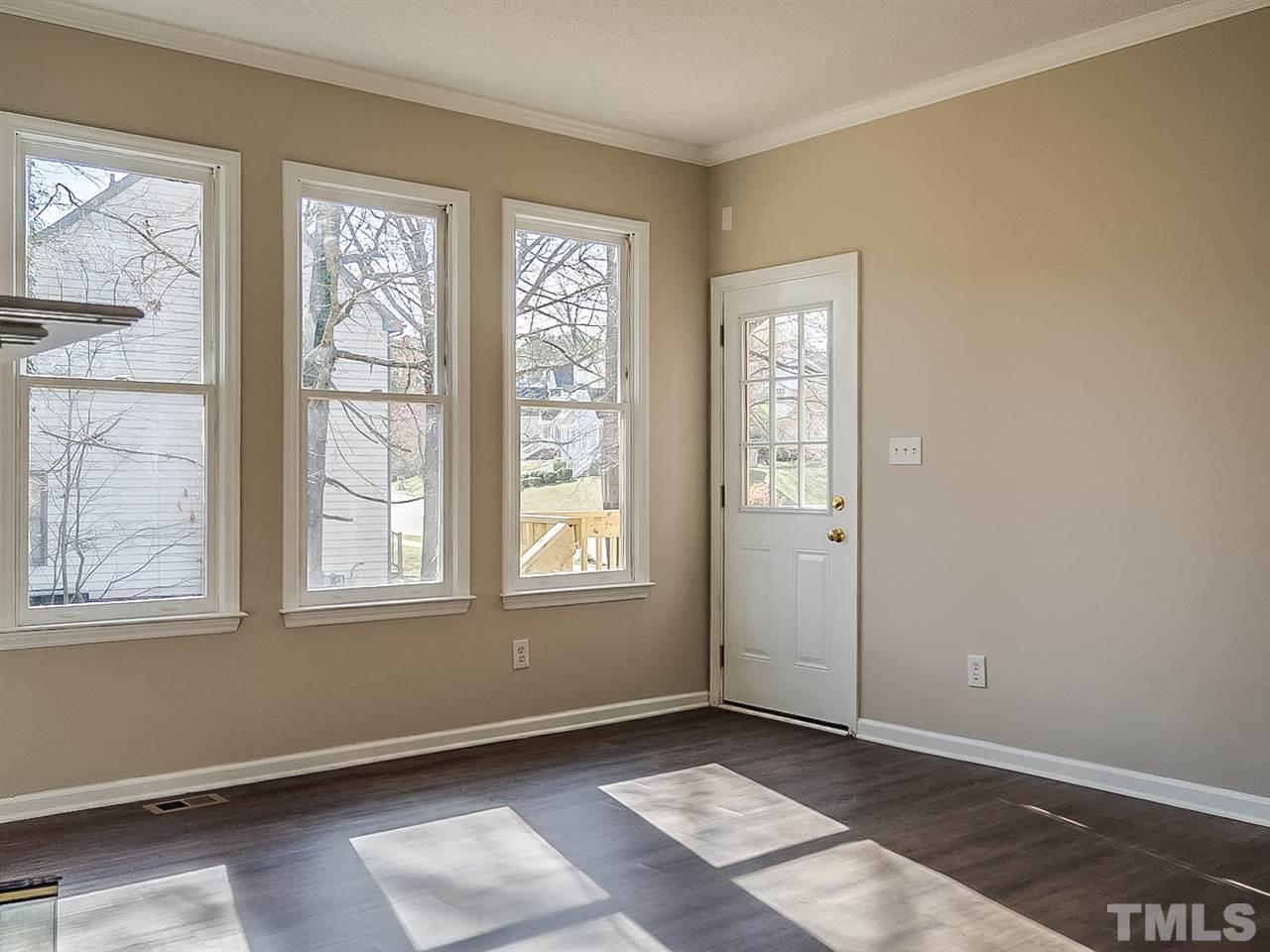 2500 Holbrook Court Raleigh, NC 27604 - Photo 7 of 26 an empty room with windows