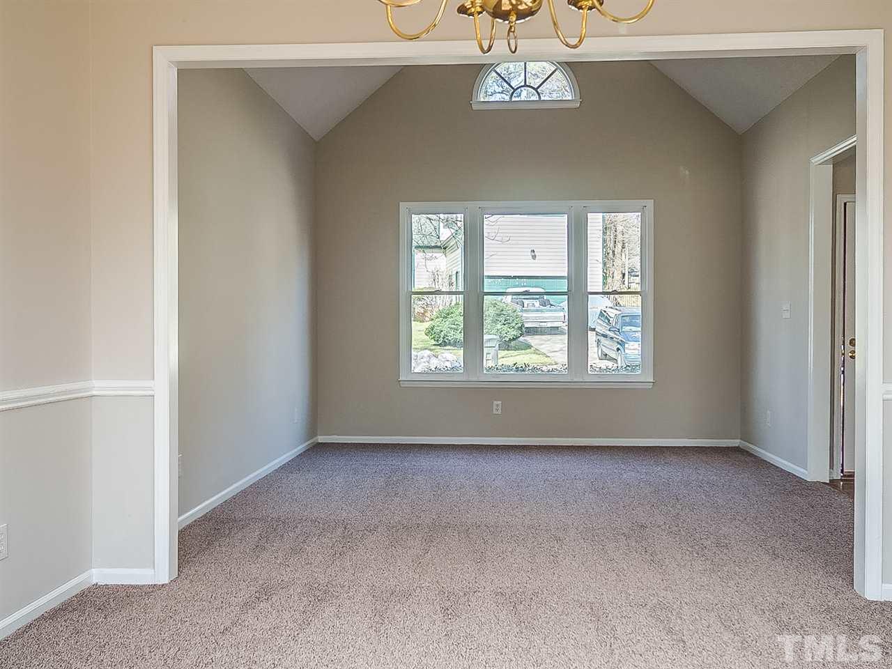 2500 Holbrook Court Raleigh, NC 27604 - Photo 9 of 26 an empty room with a window