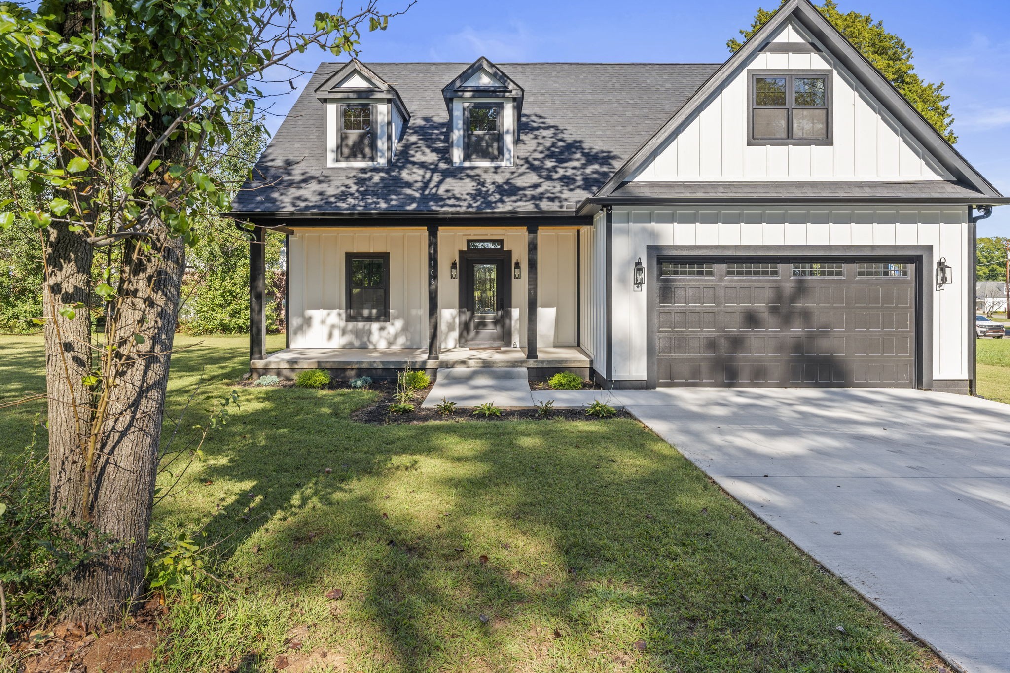 106 5th Avenue North Decherd, TN 37324 - Photo 2 of 50 a front view of a house with a yard
