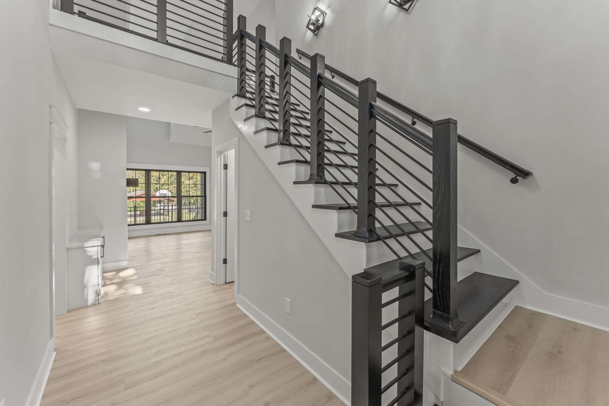 106 5th Avenue North Decherd, TN 37324 - Photo 27 of 50 a view of entryway and hall with wooden floor
