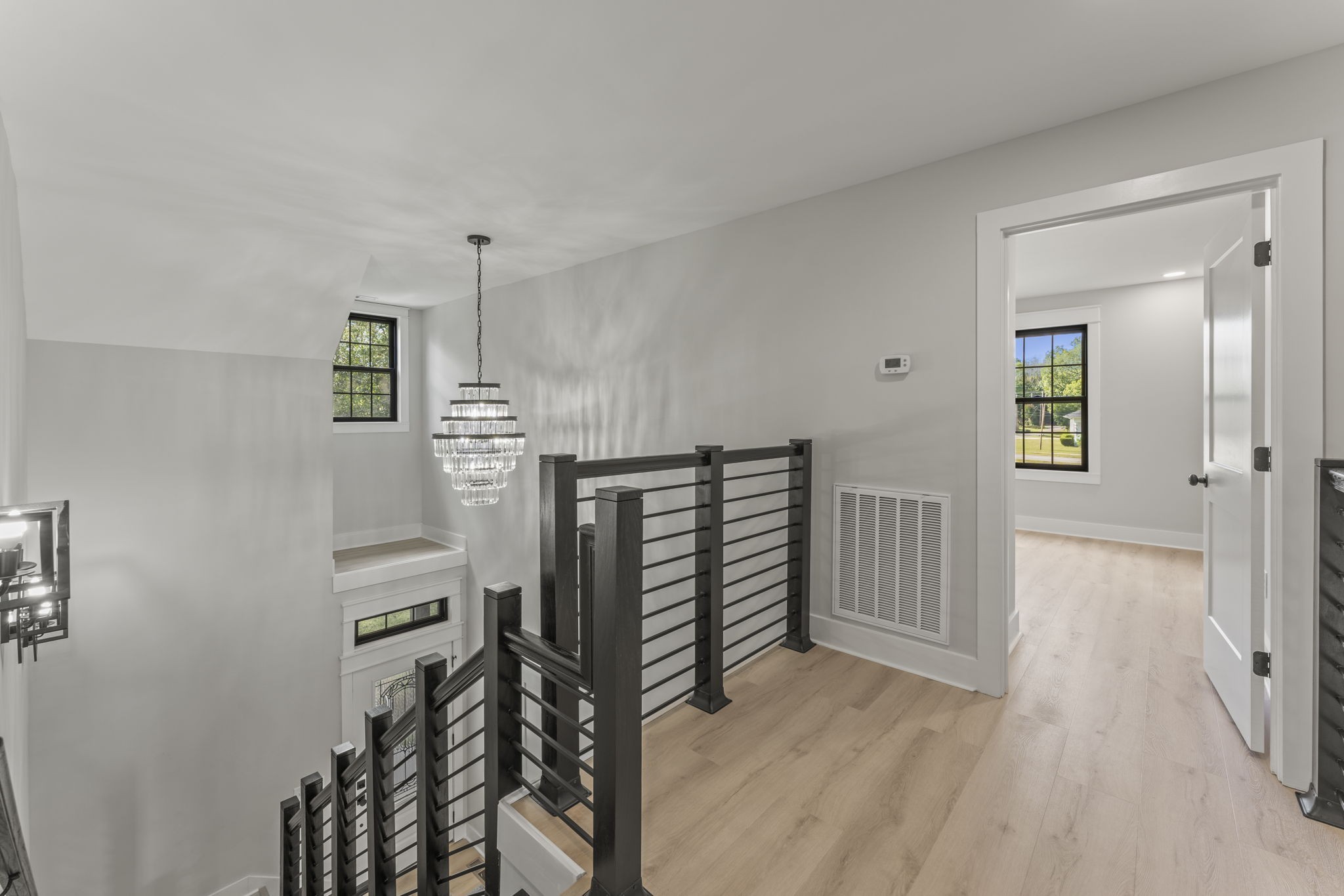 106 5th Avenue North Decherd, TN 37324 - Photo 29 of 50 a view of a hallway with stairs and furniture
