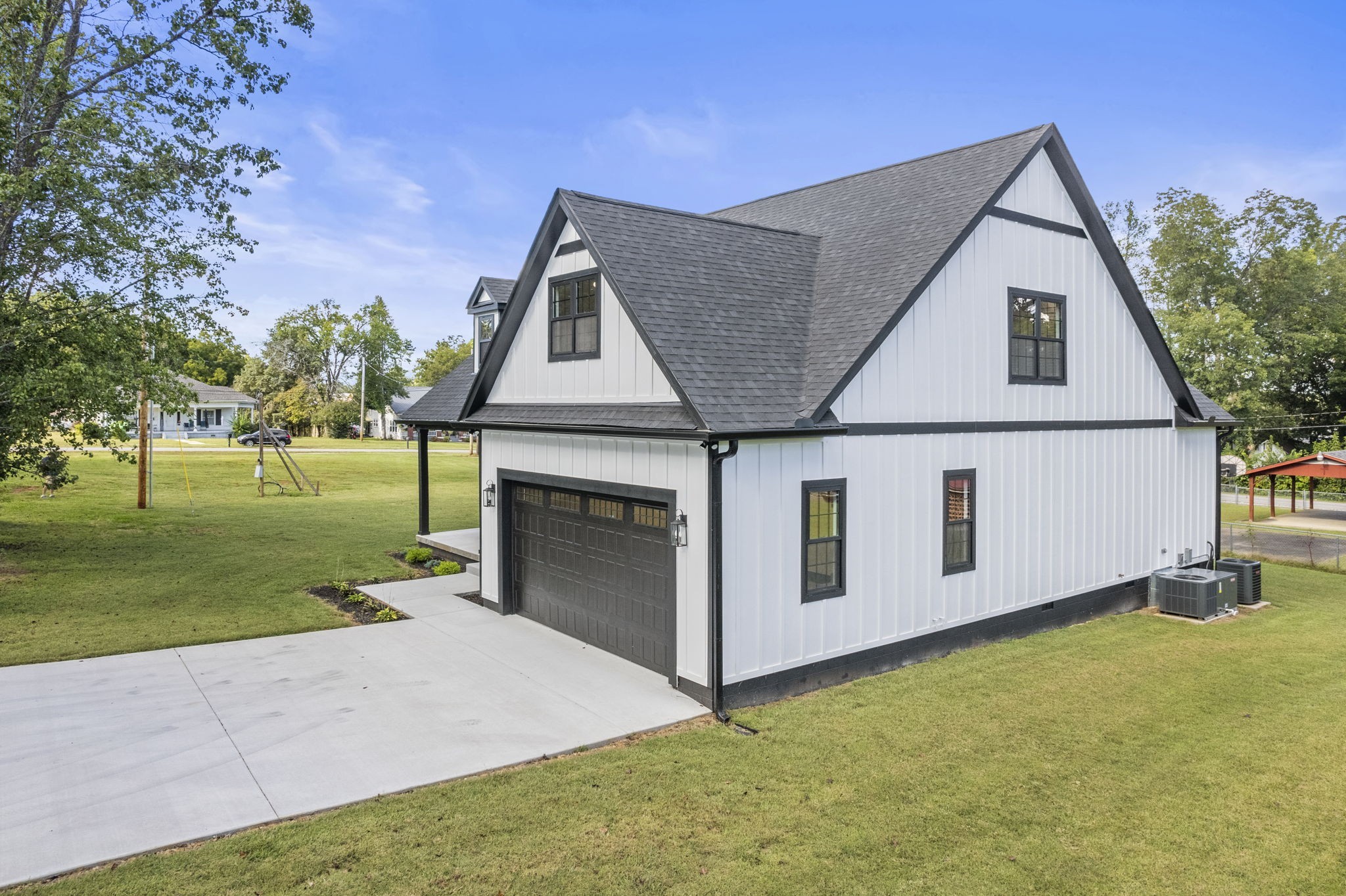 106 5th Avenue North Decherd, TN 37324 - Photo 35 of 50 a view of a house with a yard