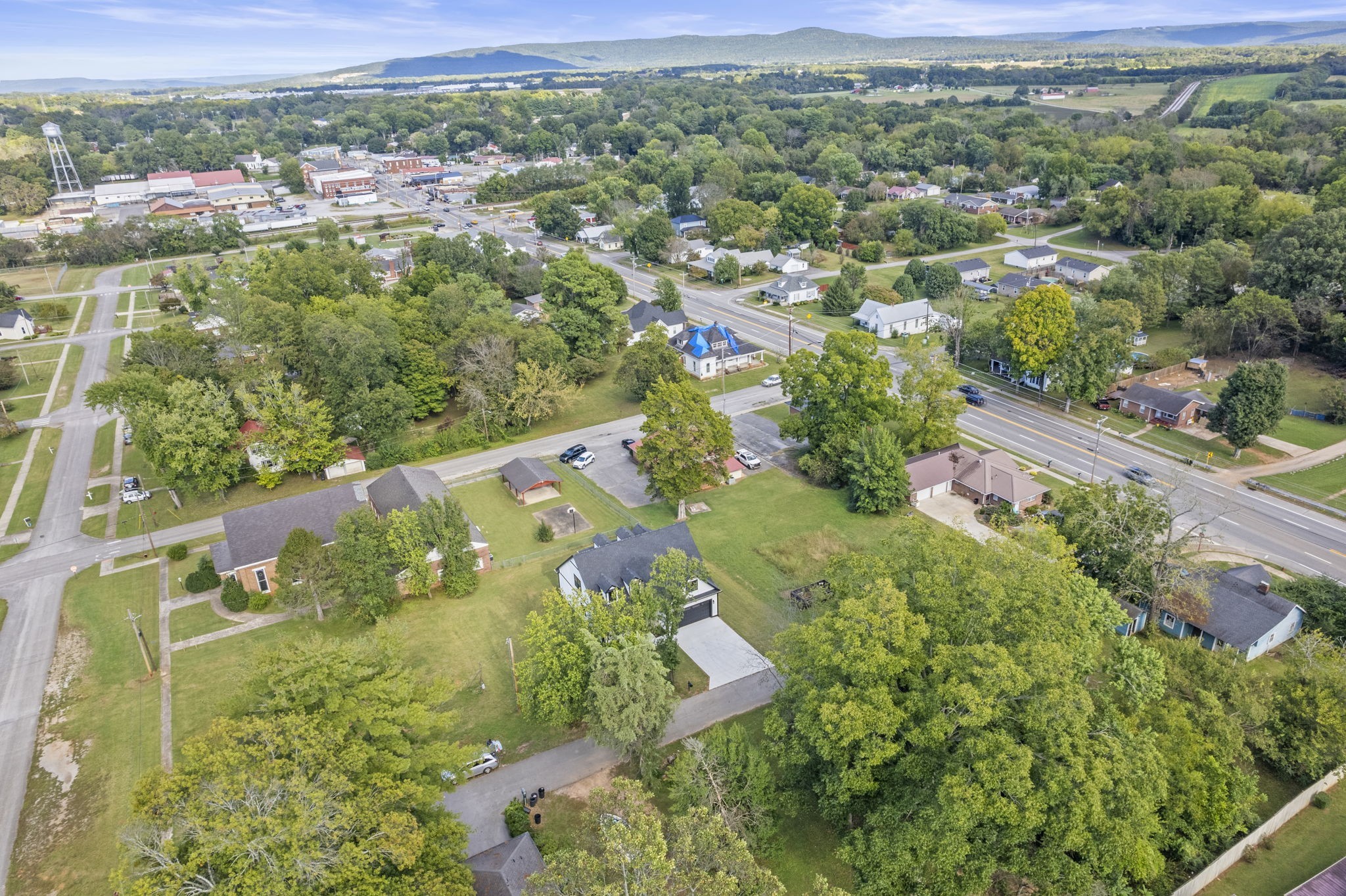106 5th Avenue North Decherd, TN 37324 - Photo 37 of 50 an aerial view of residential houses with outdoor space and trees