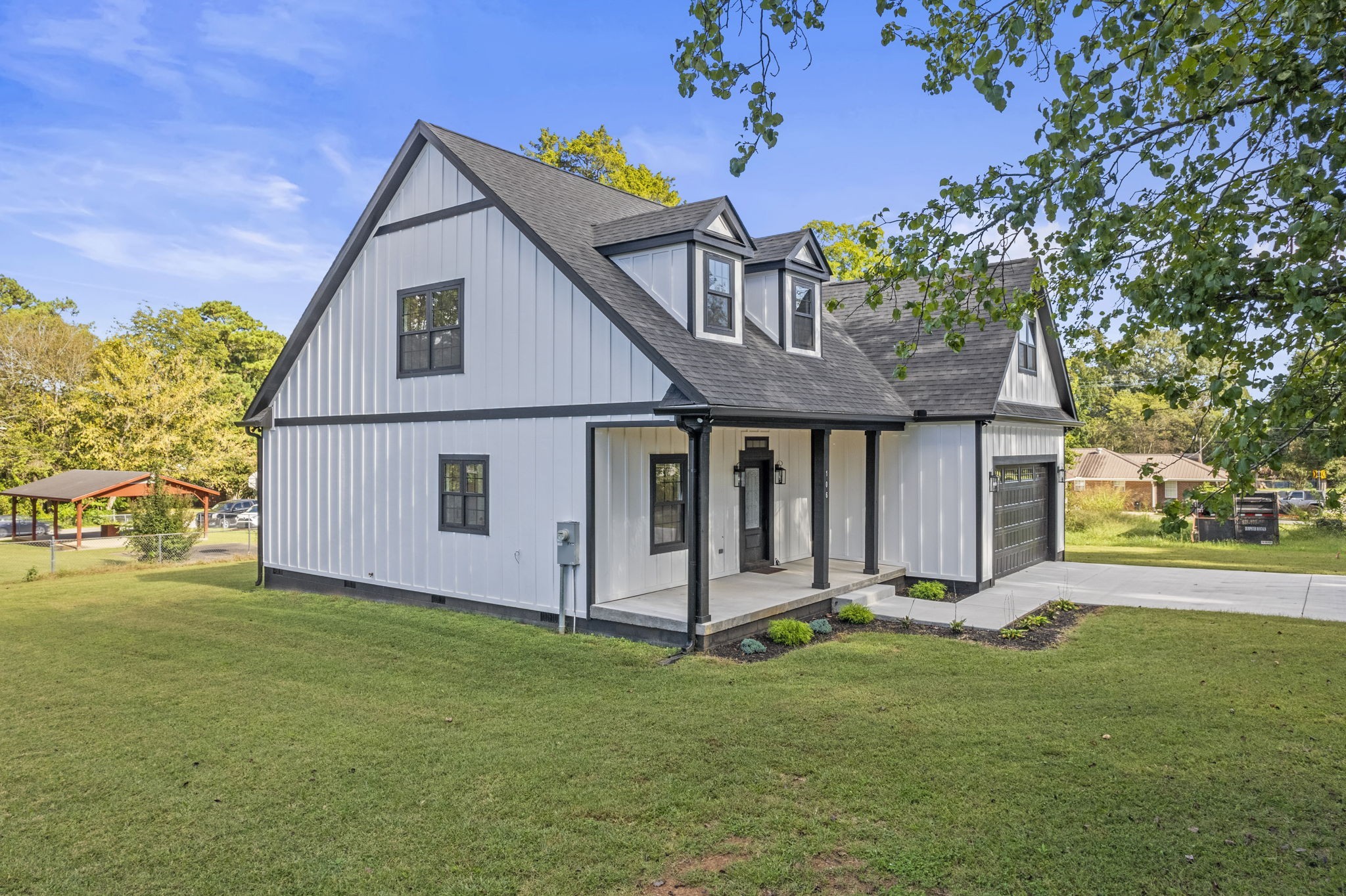 106 5th Avenue North Decherd, TN 37324 - Photo 4 of 50 a view of a house with garden and yard