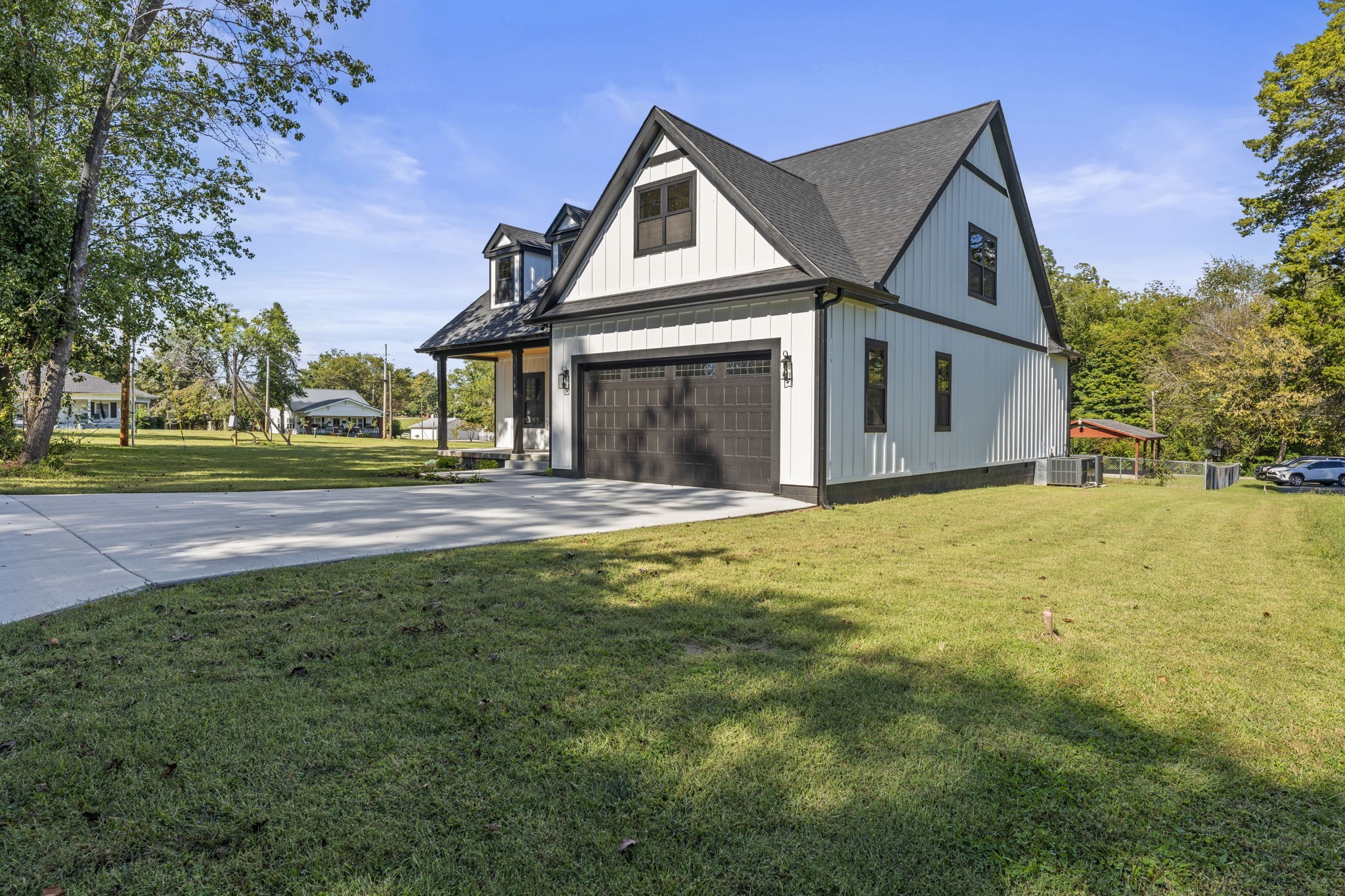 106 5th Avenue North Decherd, TN 37324 - Photo 44 of 50 a front view of a house with a yard