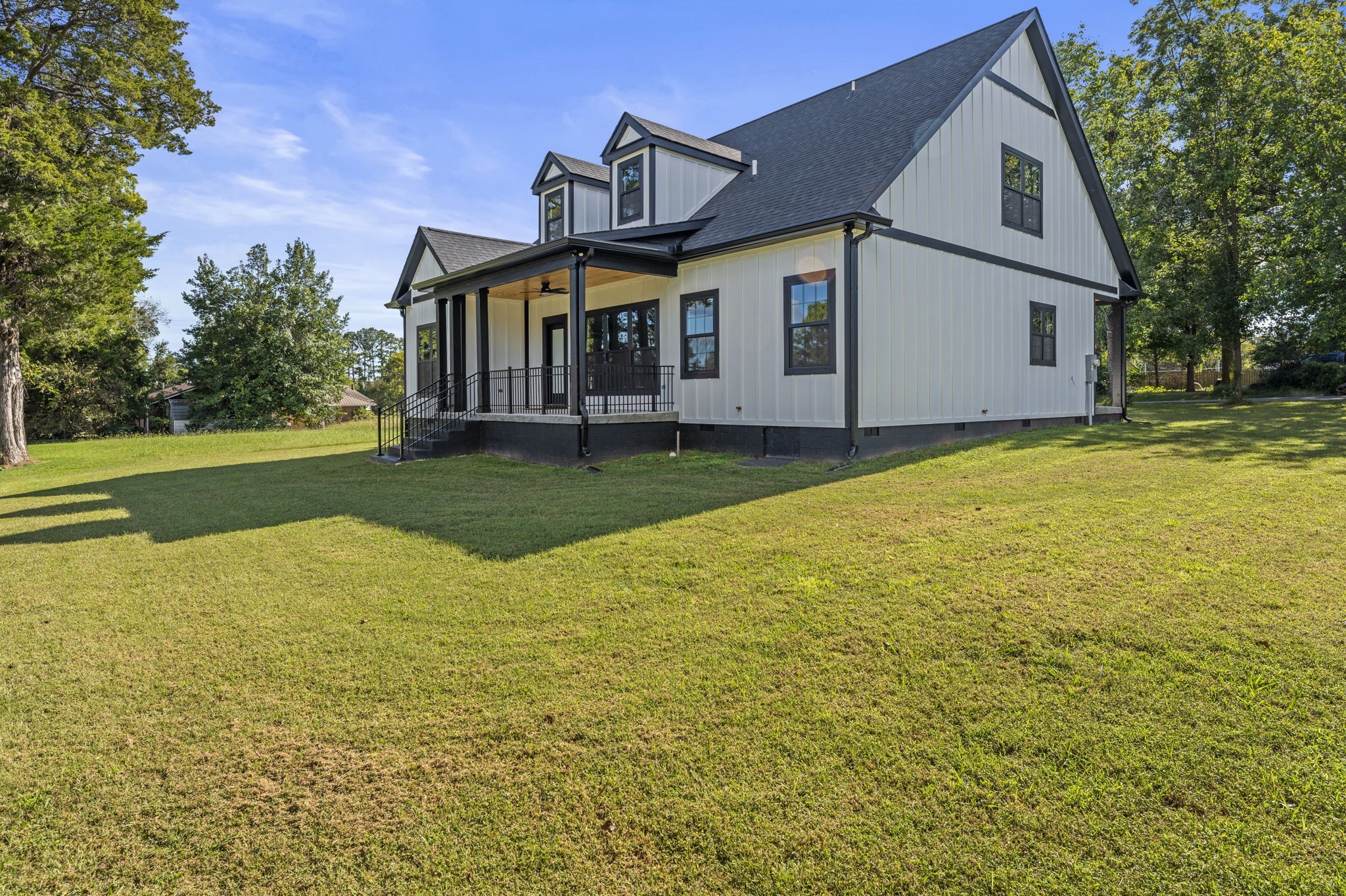 106 5th Avenue North Decherd, TN 37324 - Photo 46 of 50 a view of a house with a yard and sitting area