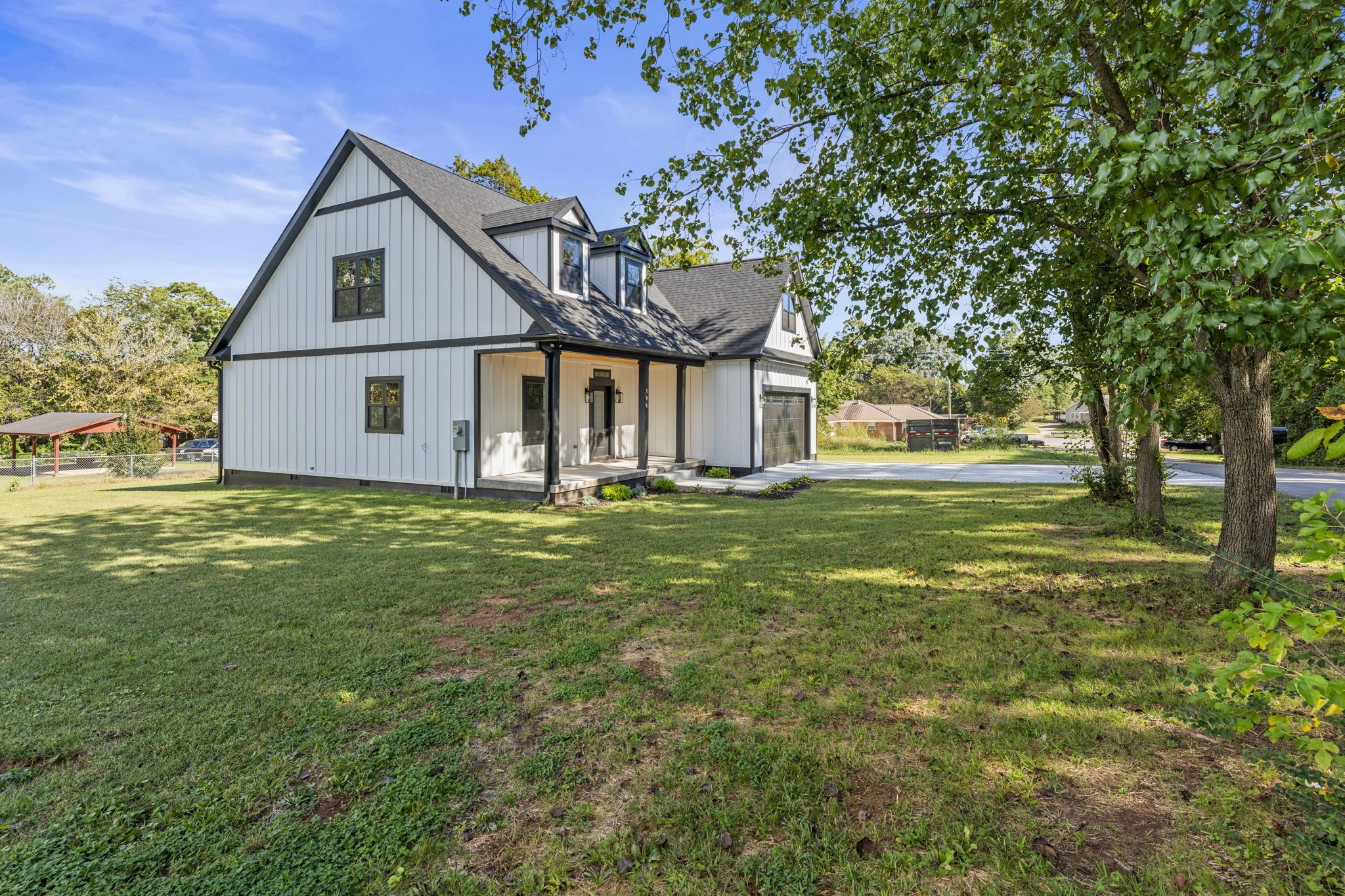 106 5th Avenue North Decherd, TN 37324 - Photo 47 of 50 a front view of house with yard and green space
