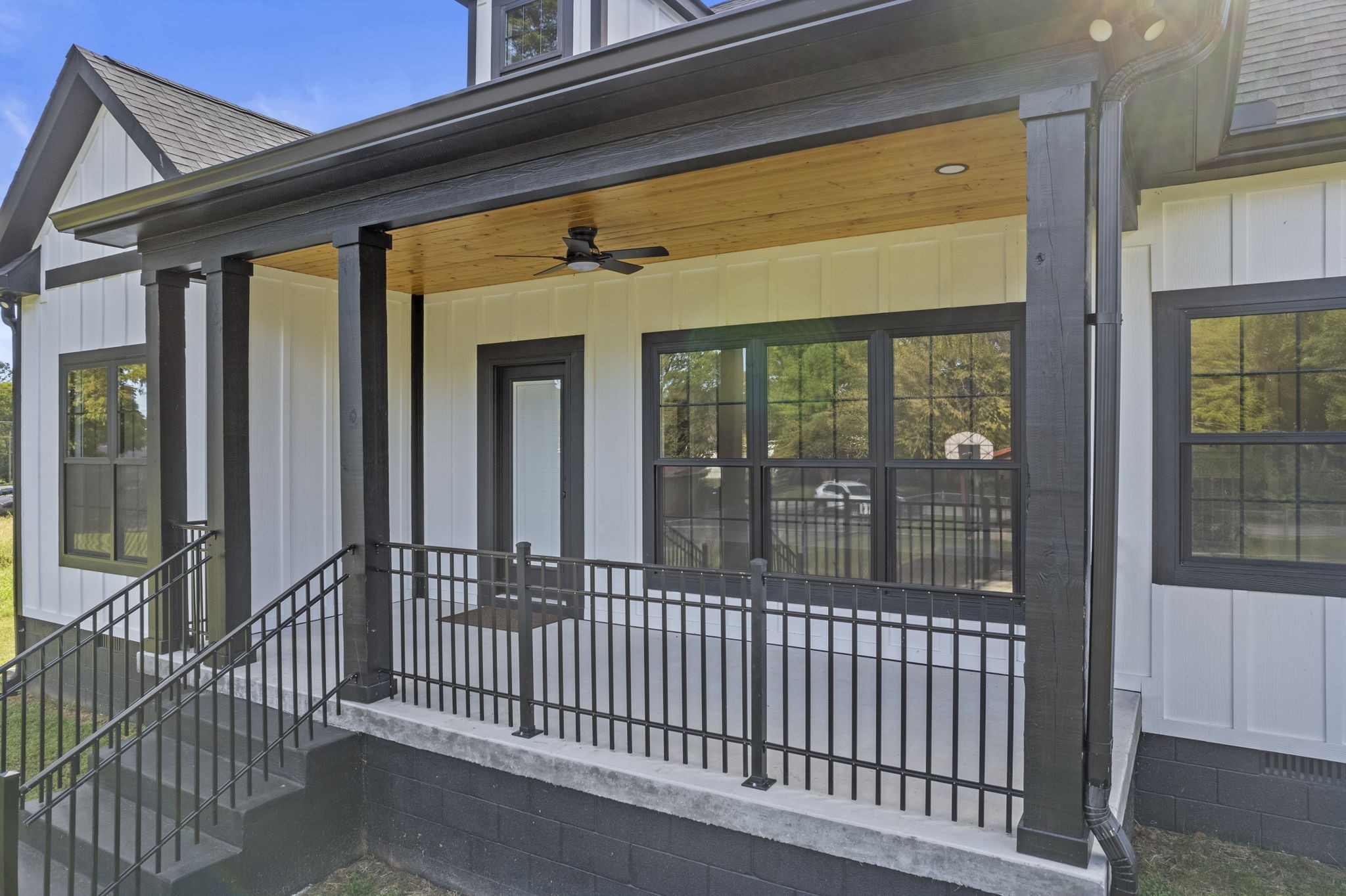 106 5th Avenue North Decherd, TN 37324 - Photo 7 of 50 a view of a porch with a floor to ceiling window