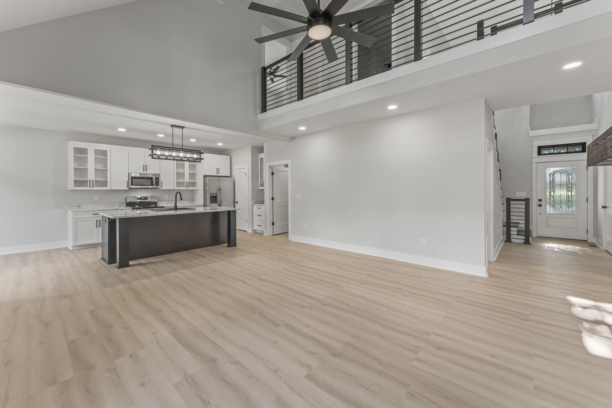 106 5th Avenue North Decherd, TN 37324 - Photo 10 of 50 a view of a kitchen with a sink and a refrigerator