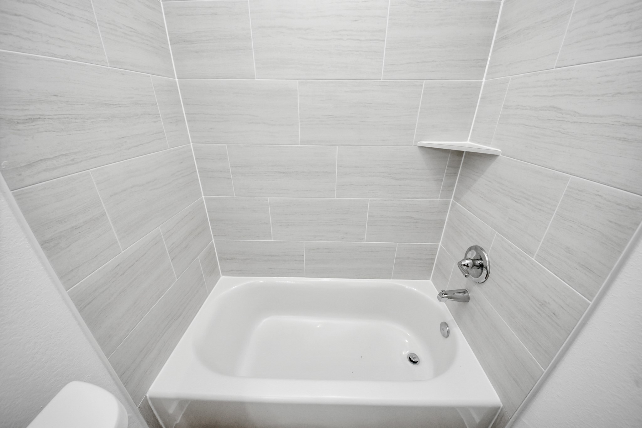 7312 Wileyvale Road, Unit C Houston, TX 77016 - Photo 31 of 39 a close up of a bathtub curtain