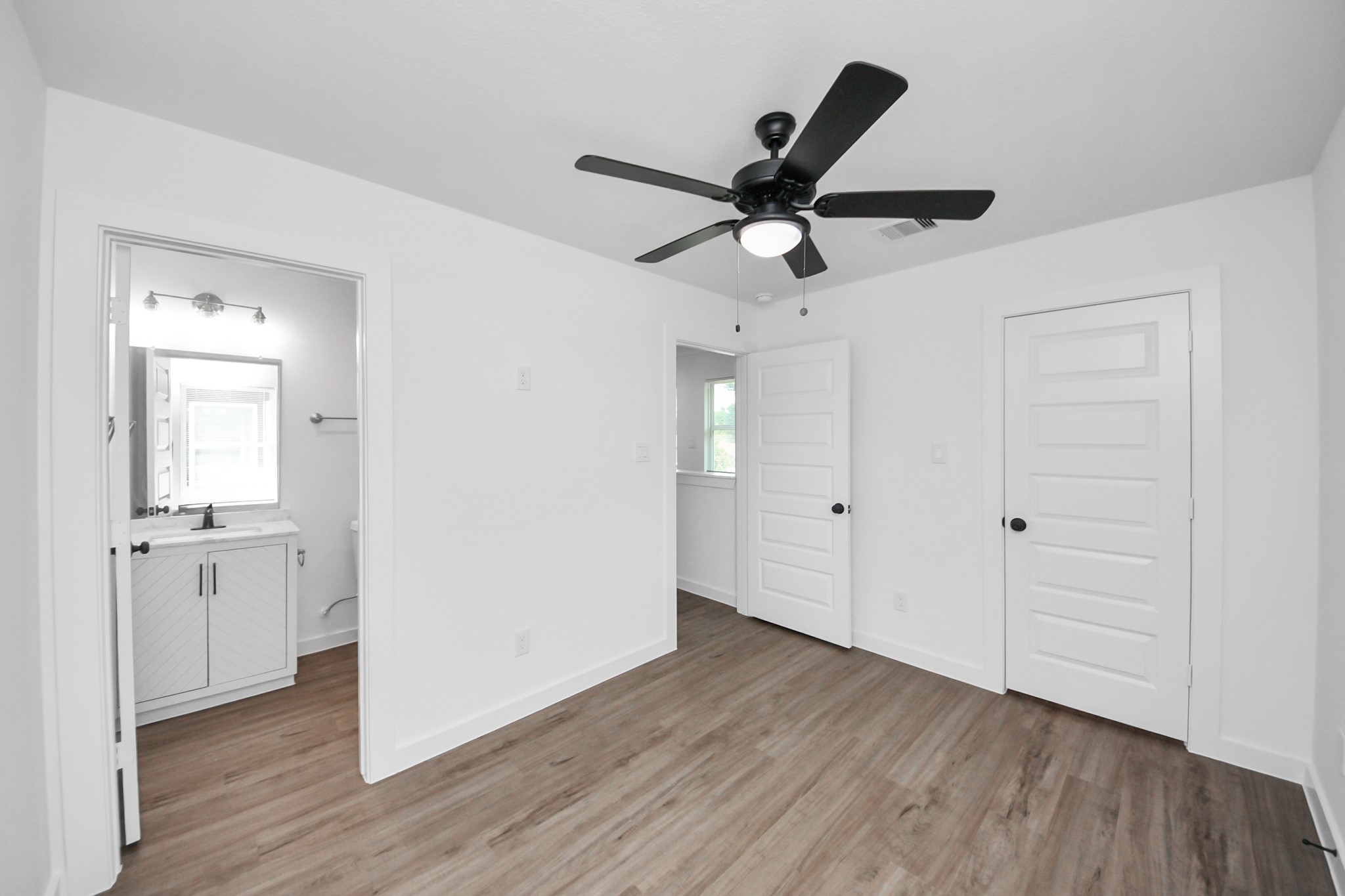 7312 Wileyvale Road, Unit C Houston, TX 77016 - Photo 35 of 39 a view of an empty room and wooden floor