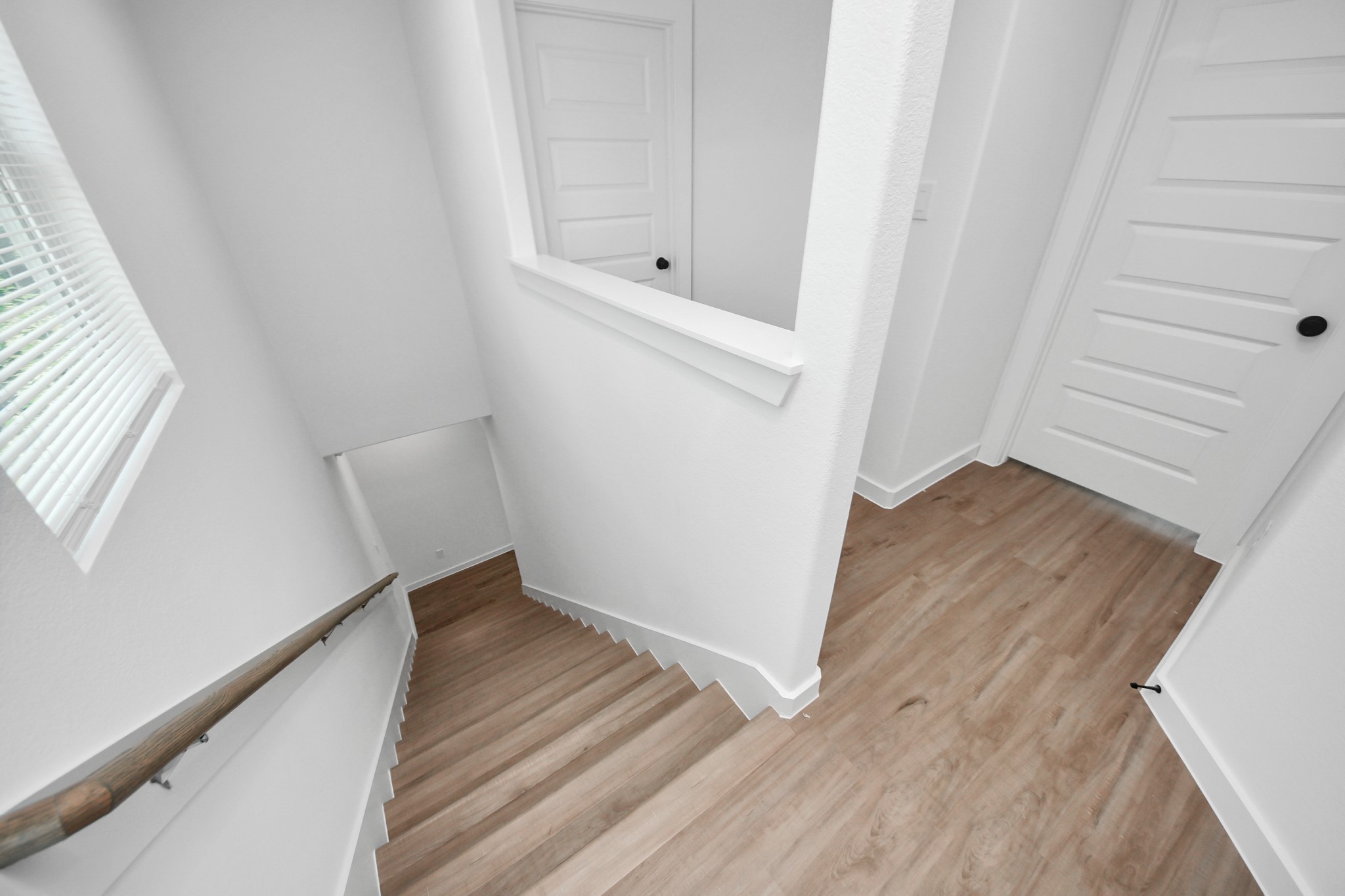 7312 Wileyvale Road, Unit C Houston, TX 77016 - Photo 37 of 39 a view of an empty room and wooden floor