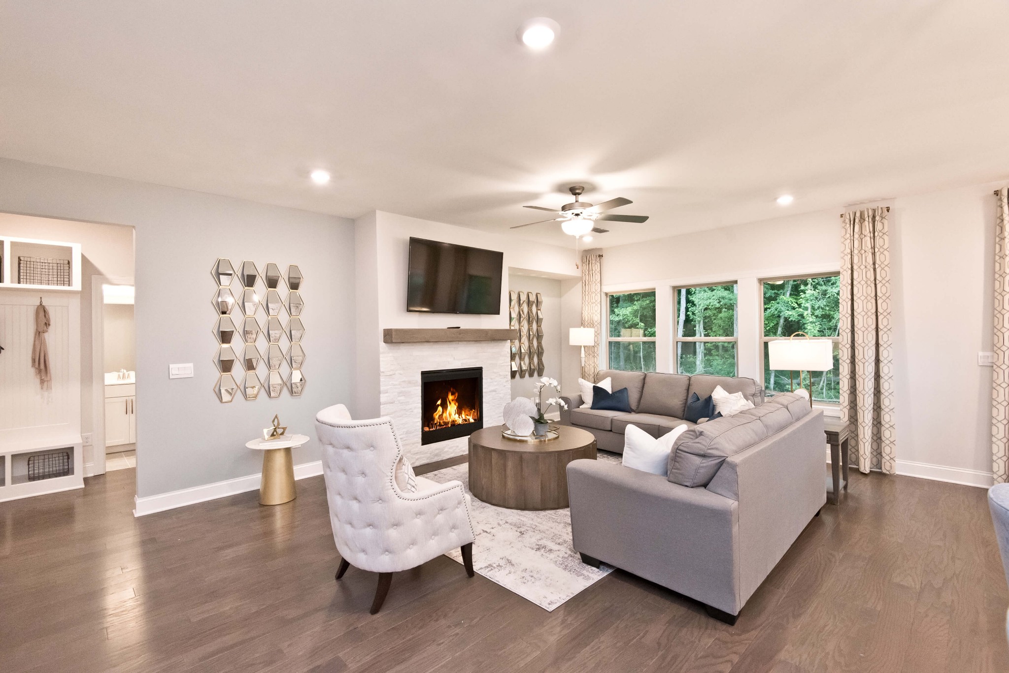 698 Castle Road Mount Juliet, TN 37122 - Photo 6 of 19 a living room with furniture and a fireplace