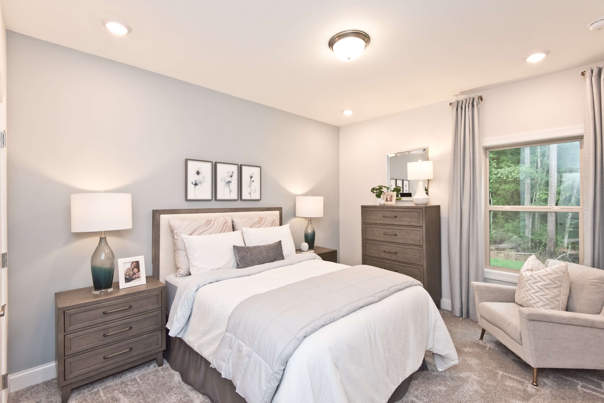 698 Castle Road Mount Juliet, TN 37122 - Photo 9 of 19 a bedroom with a large bed and a couch