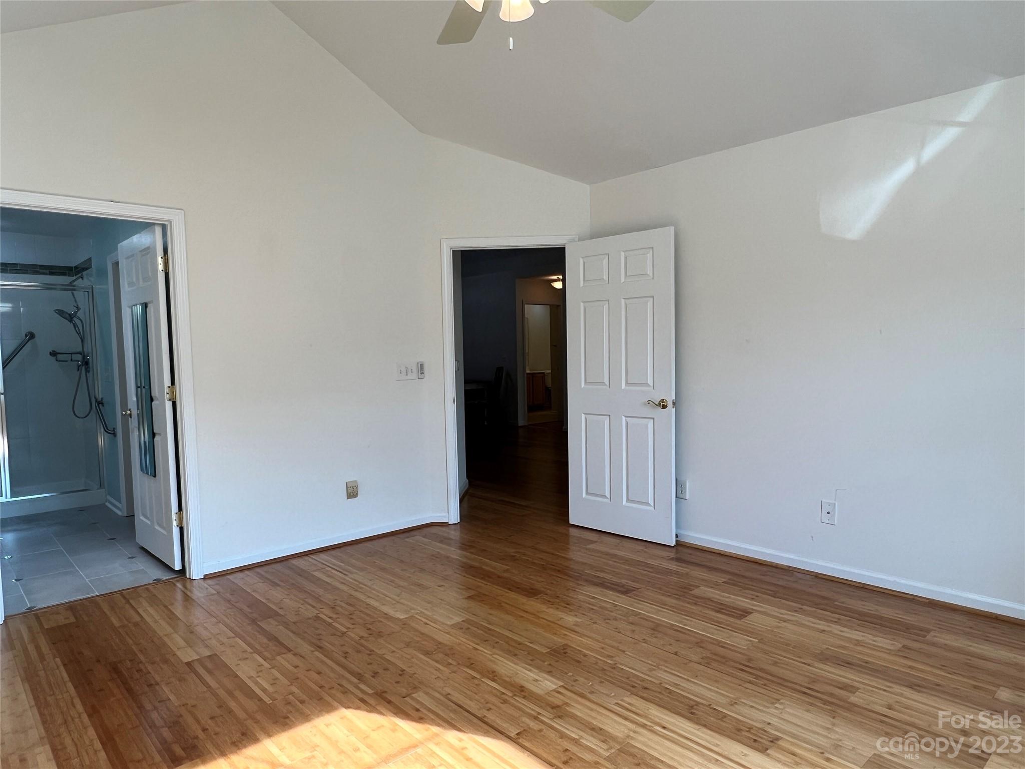 721 Ledgestone Court Tega Cay, SC 29708 - Photo 12 of 35 an empty room with wooden floor and closet
