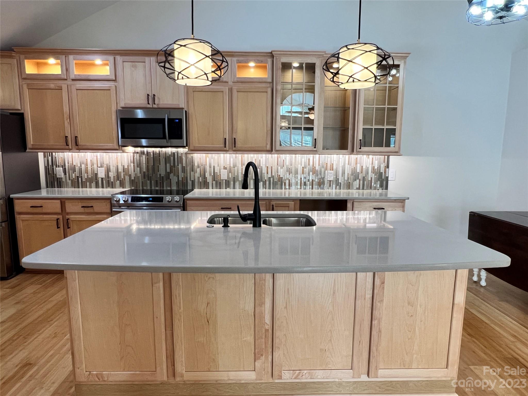721 Ledgestone Court Tega Cay, SC 29708 - Photo 16 of 35 a bathroom with a granite countertop sink and a mirror
