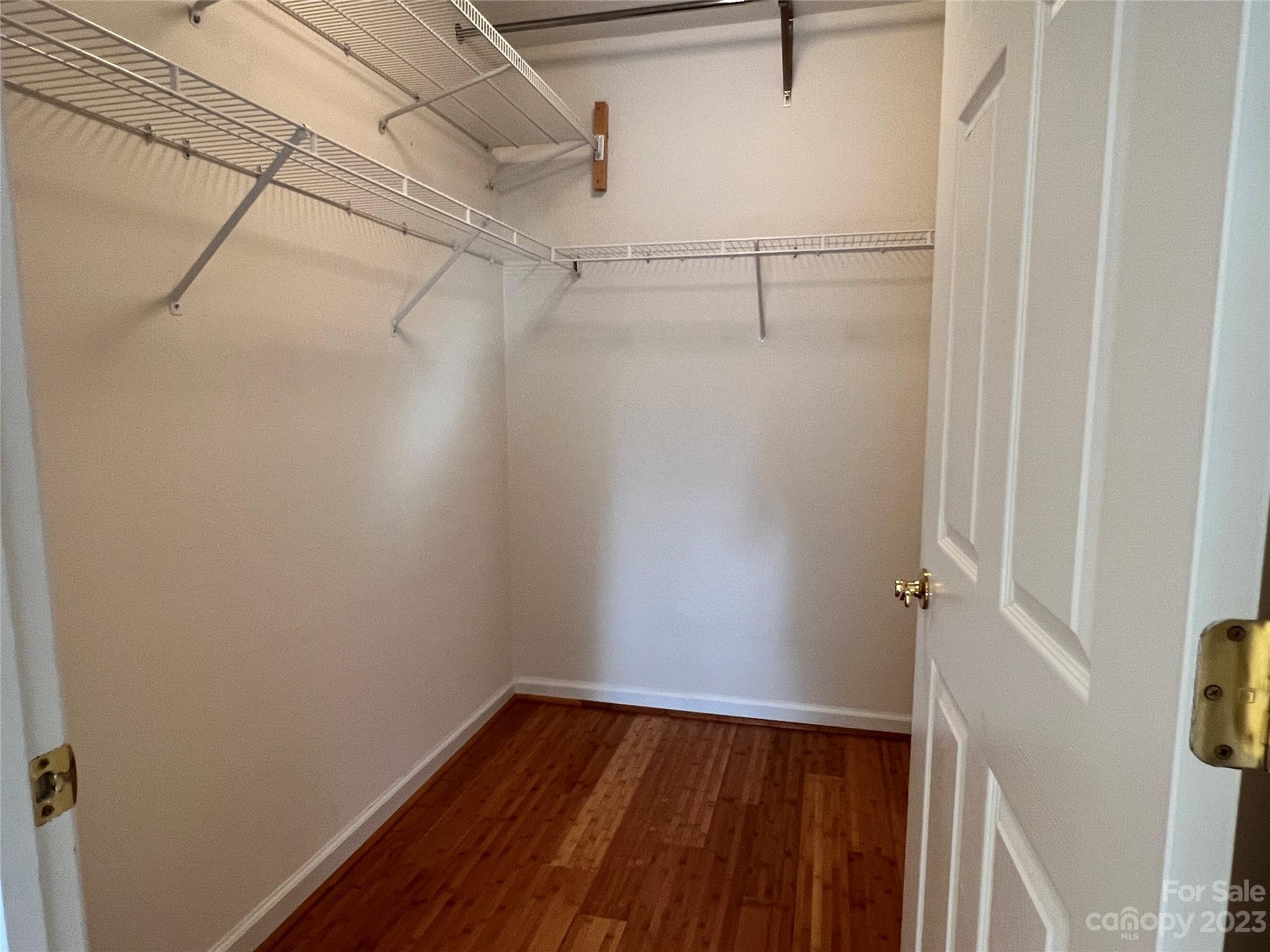 721 Ledgestone Court Tega Cay, SC 29708 - Photo 31 of 35 a view of a room with racks on the wall