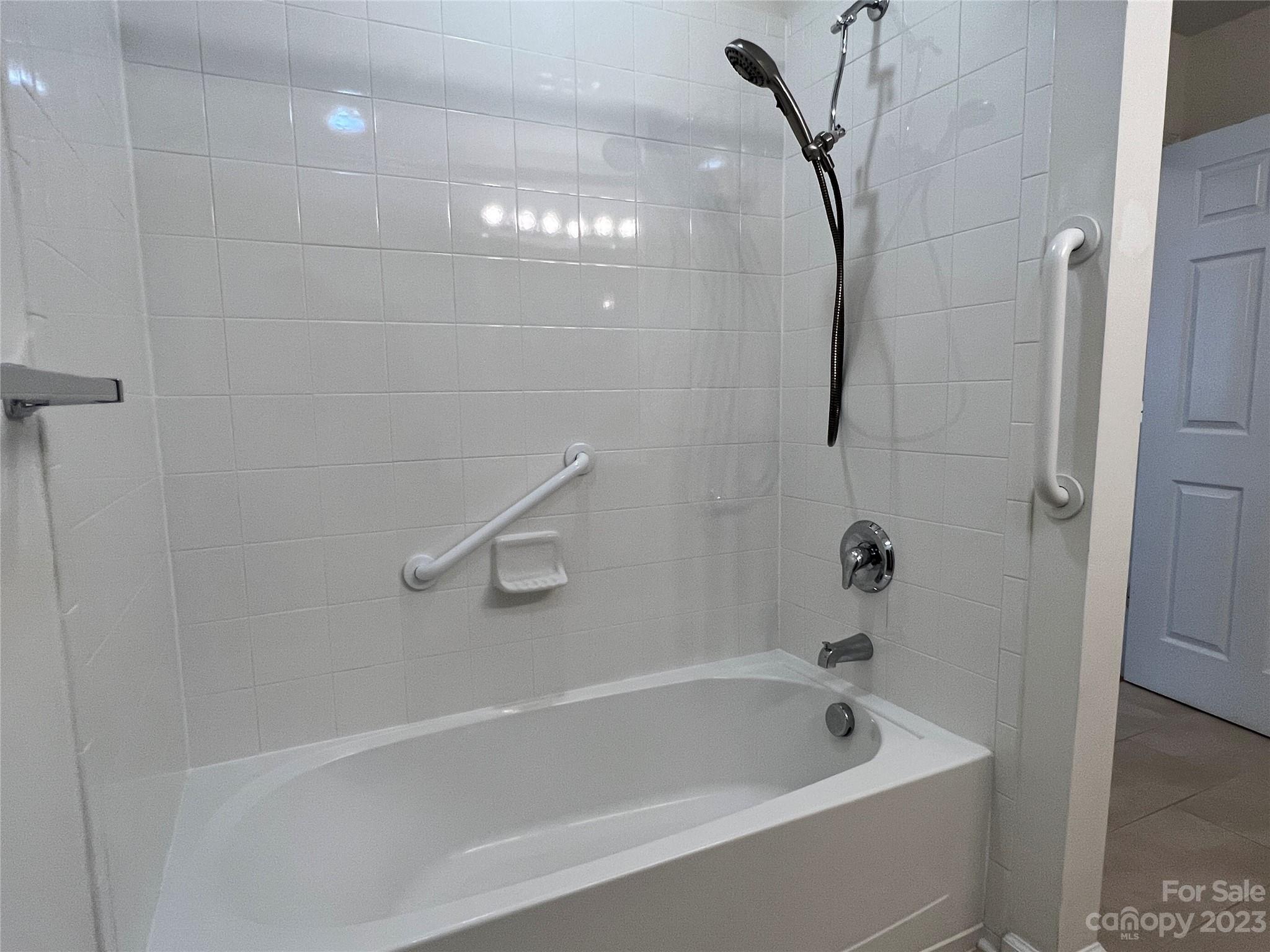 721 Ledgestone Court Tega Cay, SC 29708 - Photo 34 of 35 a bathroom with a bathtub