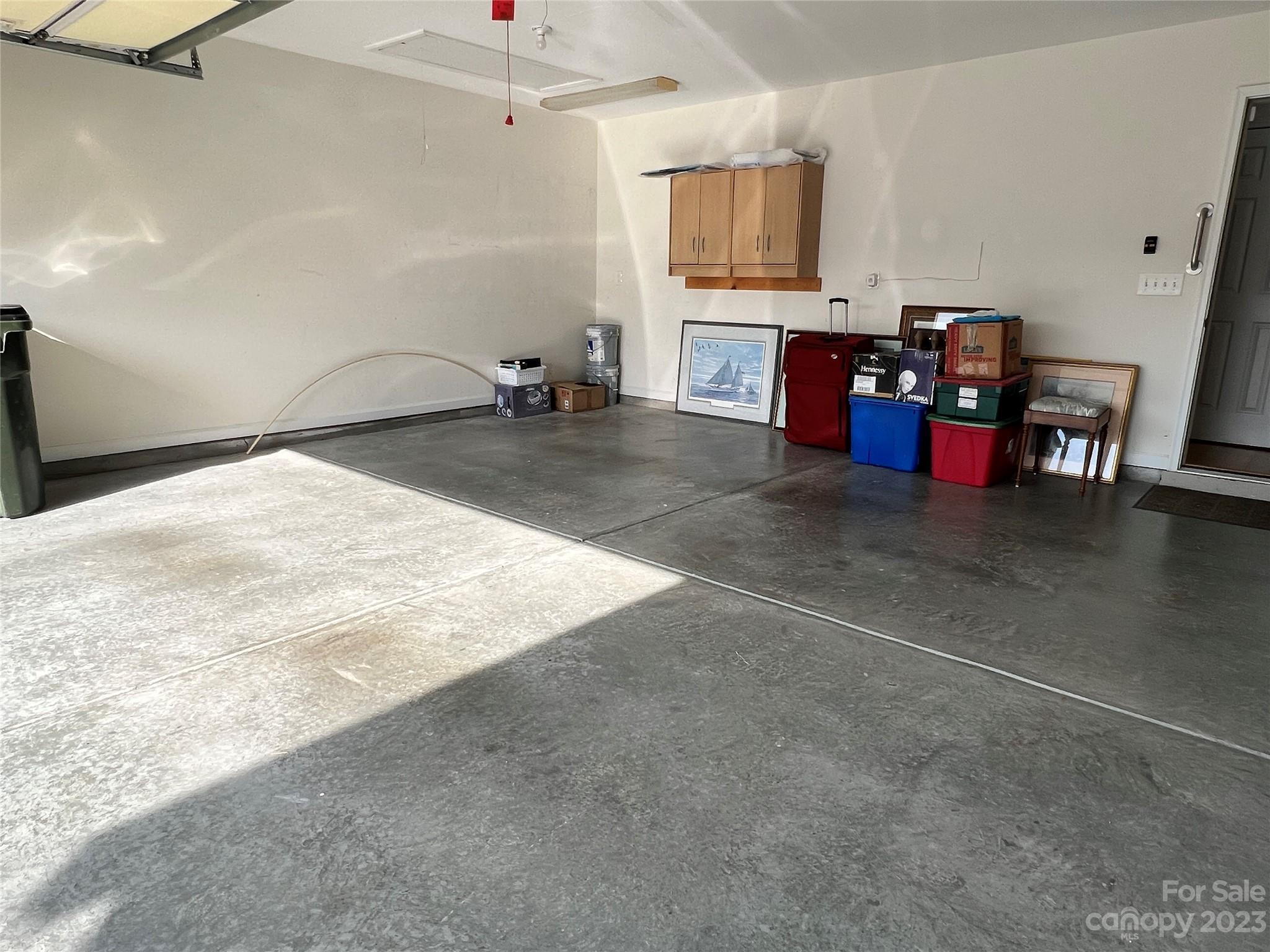 721 Ledgestone Court Tega Cay, SC 29708 - Photo 35 of 35 a living room with stainless steel appliances kitchen island granite countertop furniture and a kitchen view