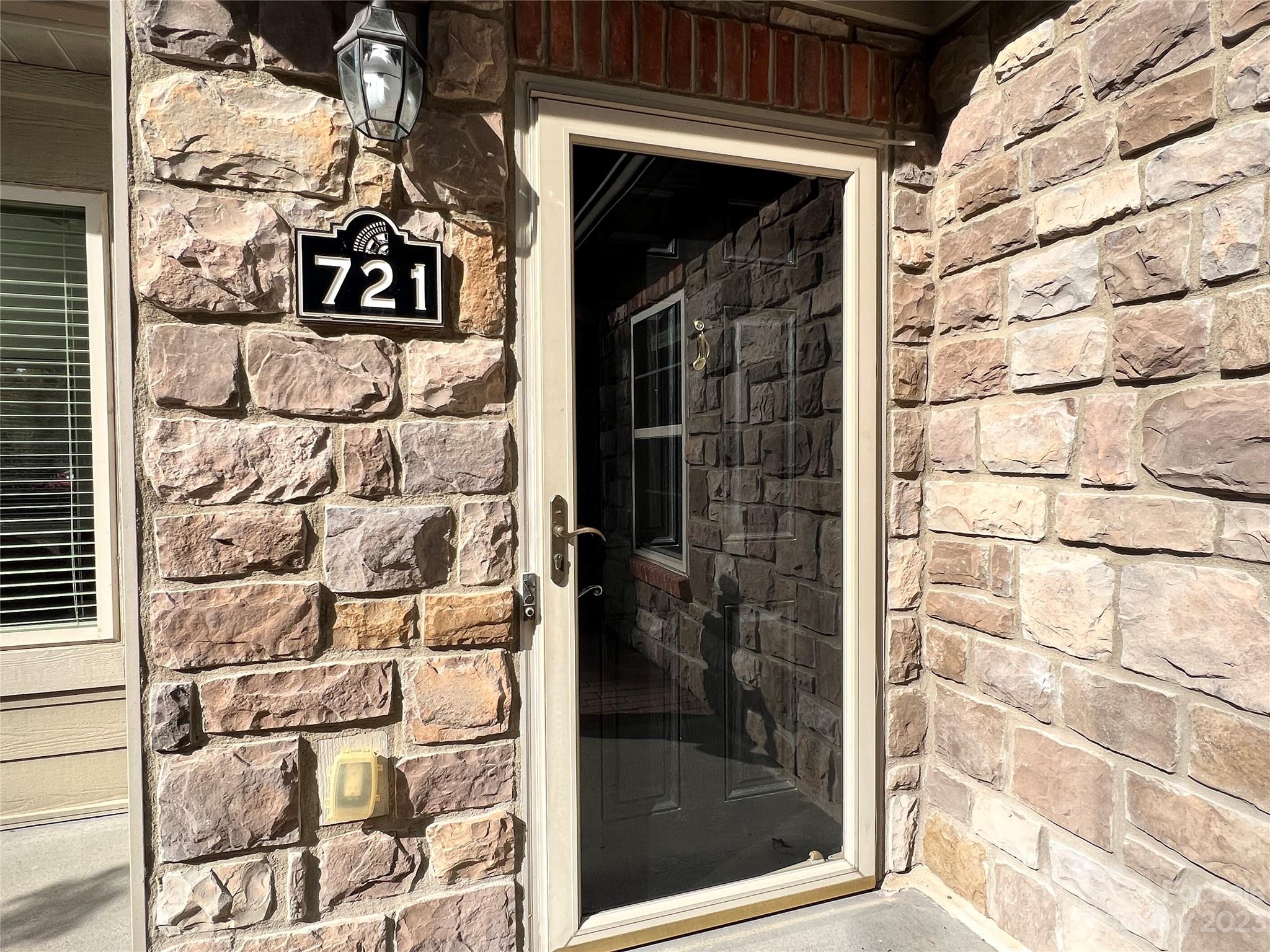 721 Ledgestone Court Tega Cay, SC 29708 - Photo 4 of 35 a view of a door and an empty room